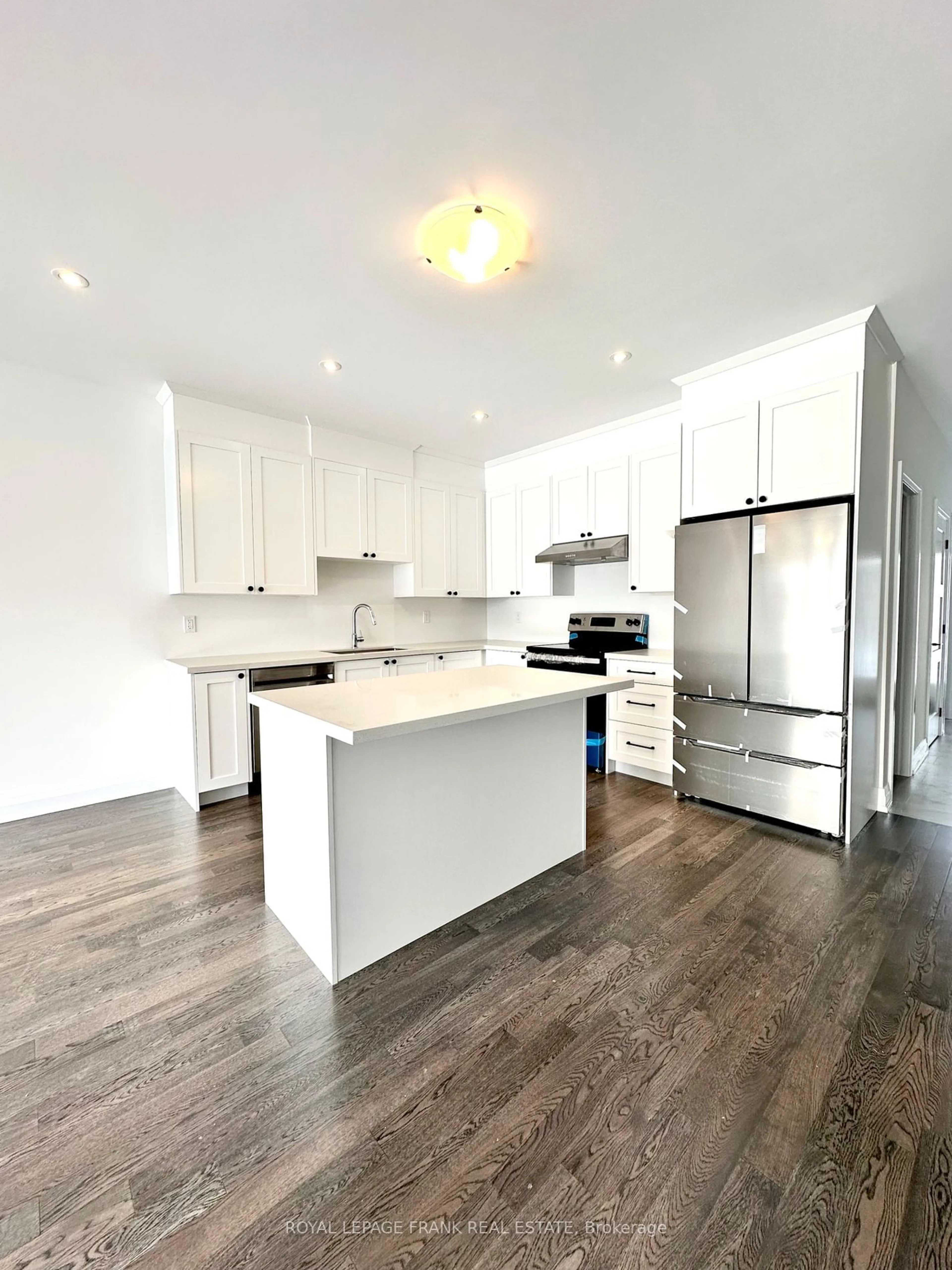 Open concept kitchen, wood/laminate floor for 12 Pond St, Trent Hills Ontario K0L 1Y0