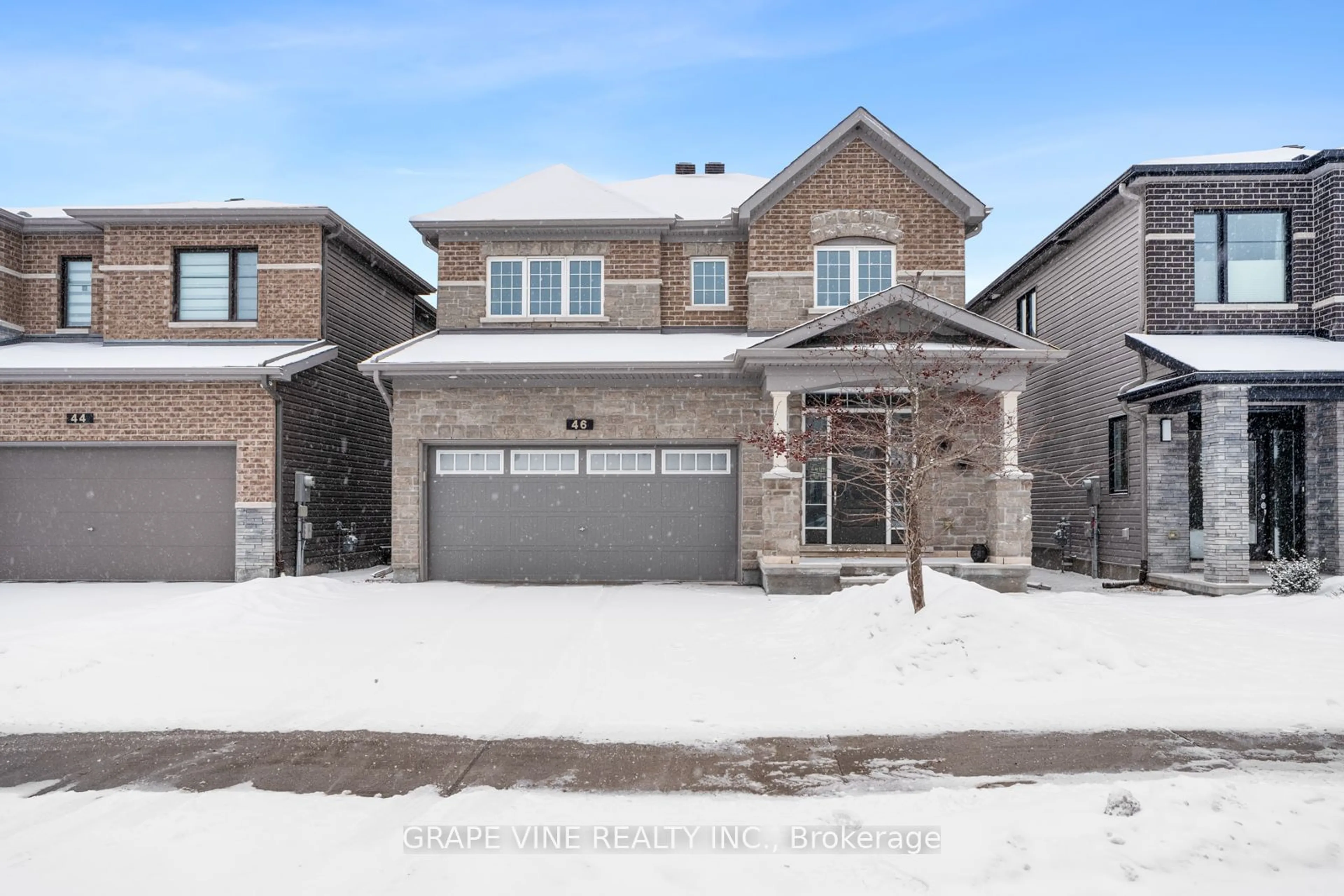 Home with brick exterior material, street for 46 Knockaderry Cres, Barrhaven Ontario K2J 6G8