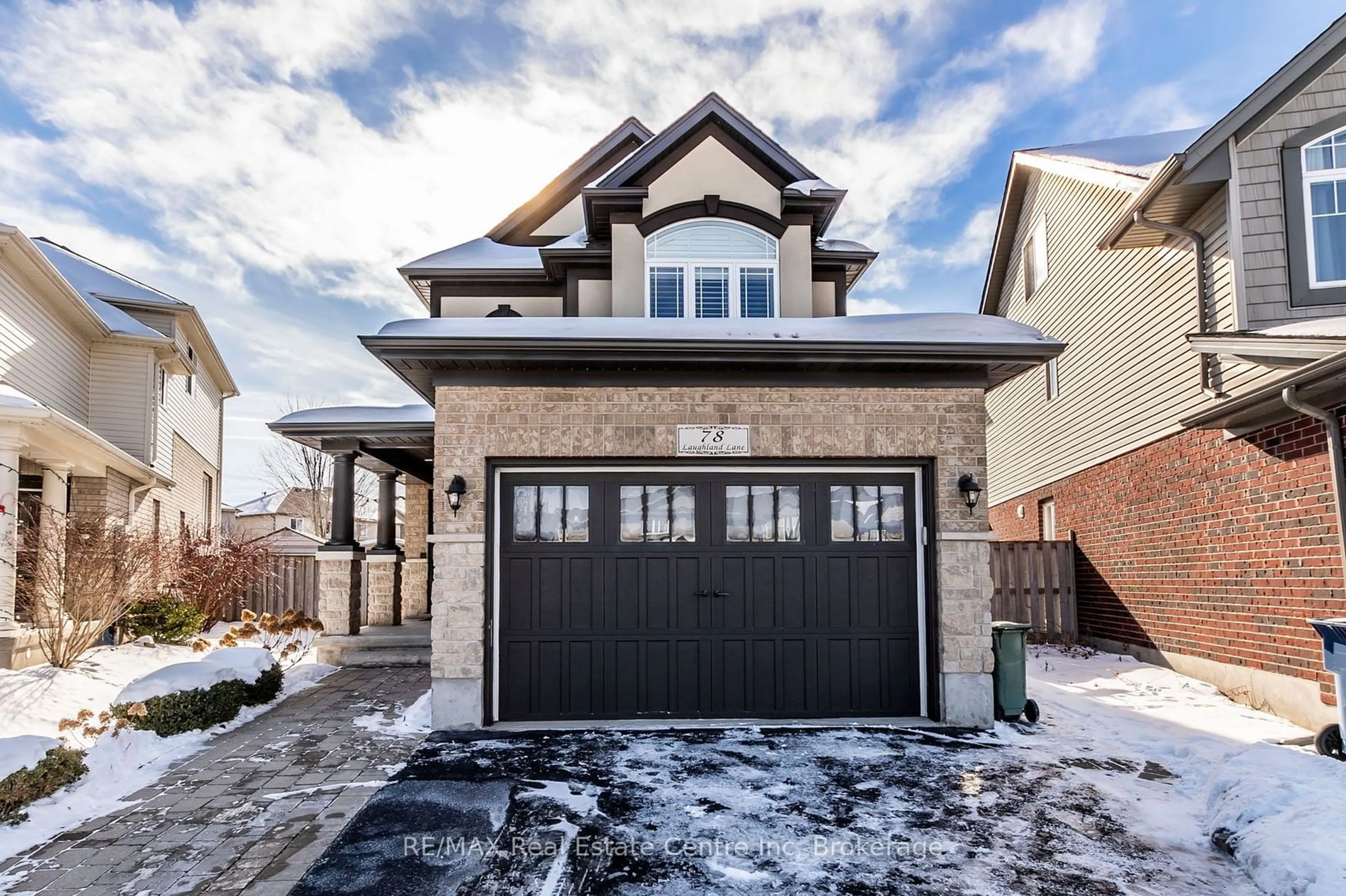 Home with brick exterior material, street for 78 Laughland Lane, Guelph Ontario N1C 0C6