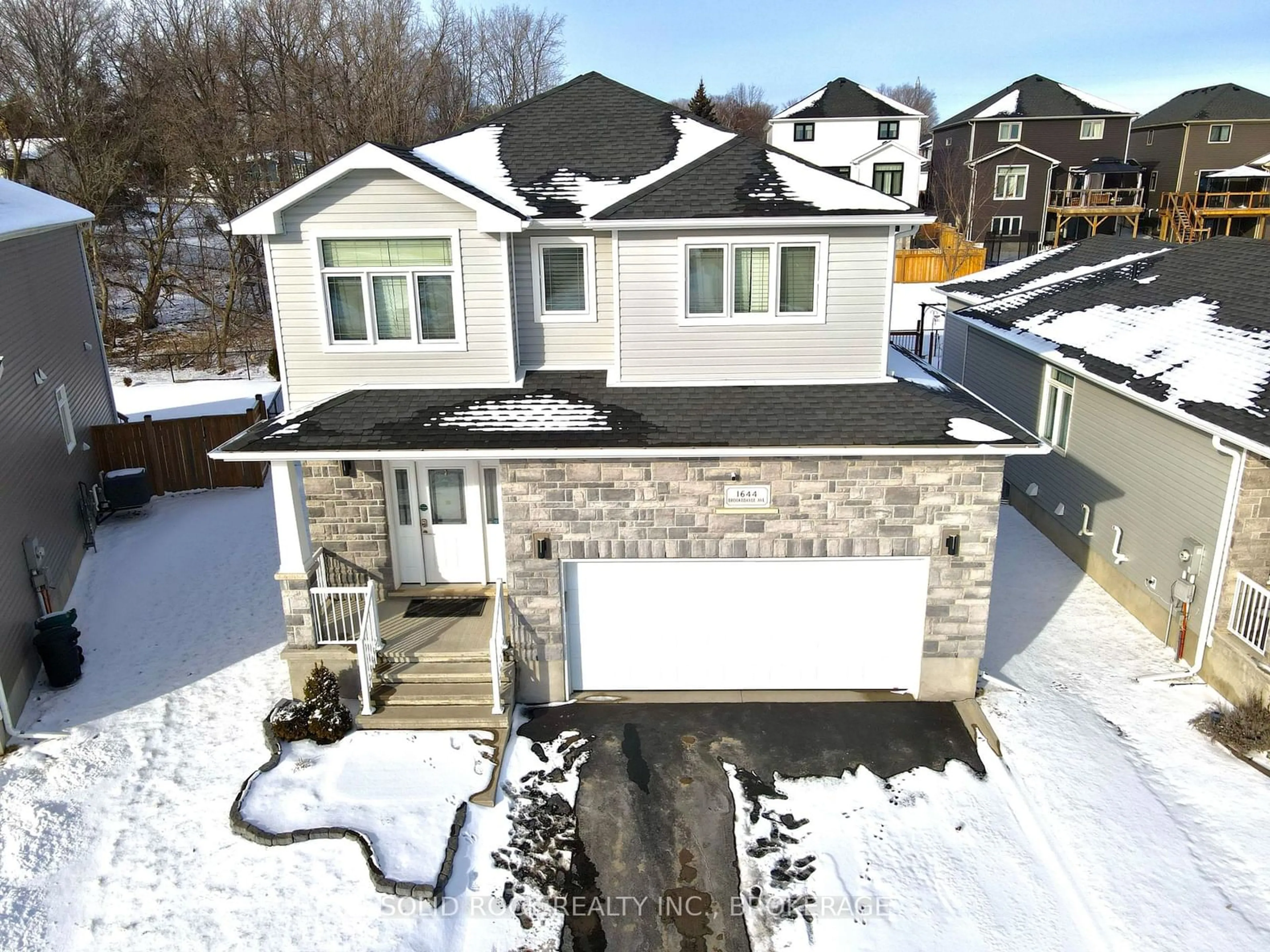 A pic from outside/outdoor area/front of a property/back of a property/a pic from drone, street for 1644 Brookedayle Ave, Kingston Ontario K7P 0S9