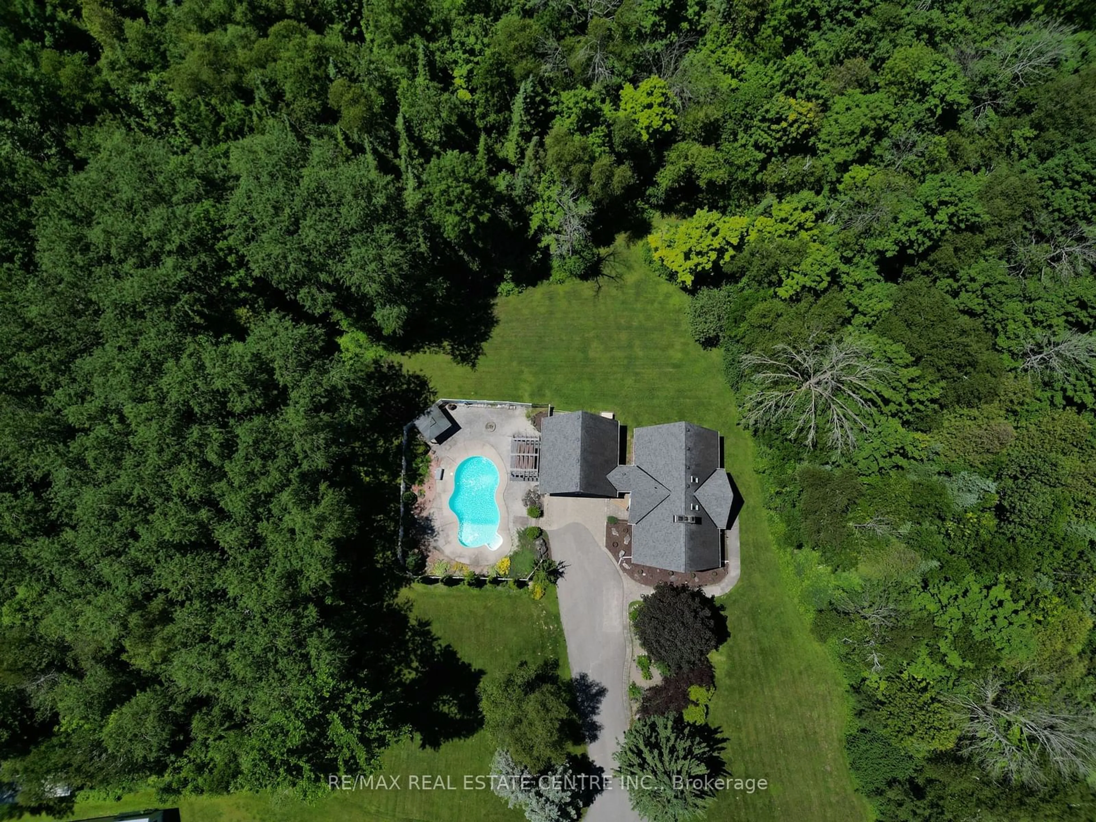 A pic from outside/outdoor area/front of a property/back of a property/a pic from drone, forest/trees view for 373376 6th Line, Amaranth Ontario L9W 0M5