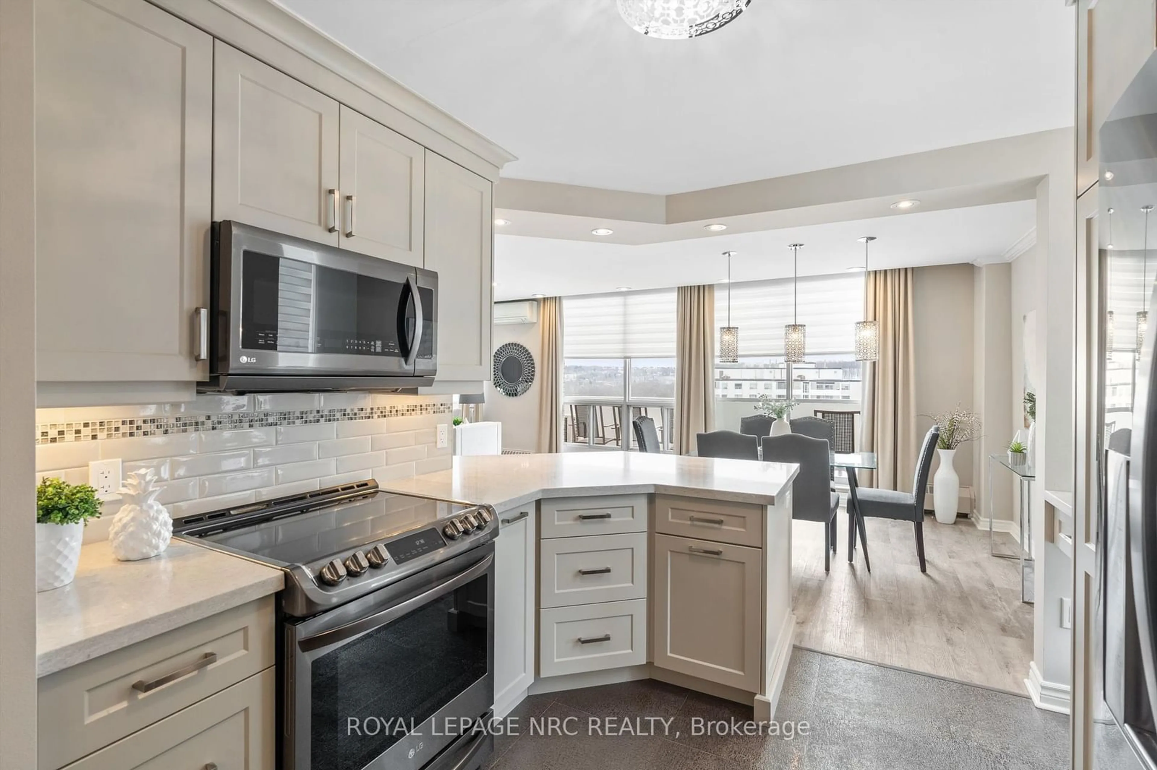 Open concept kitchen, ceramic/tile floor for 15 Towering Heights Blvd #1202, St. Catharines Ontario L2T 3G7