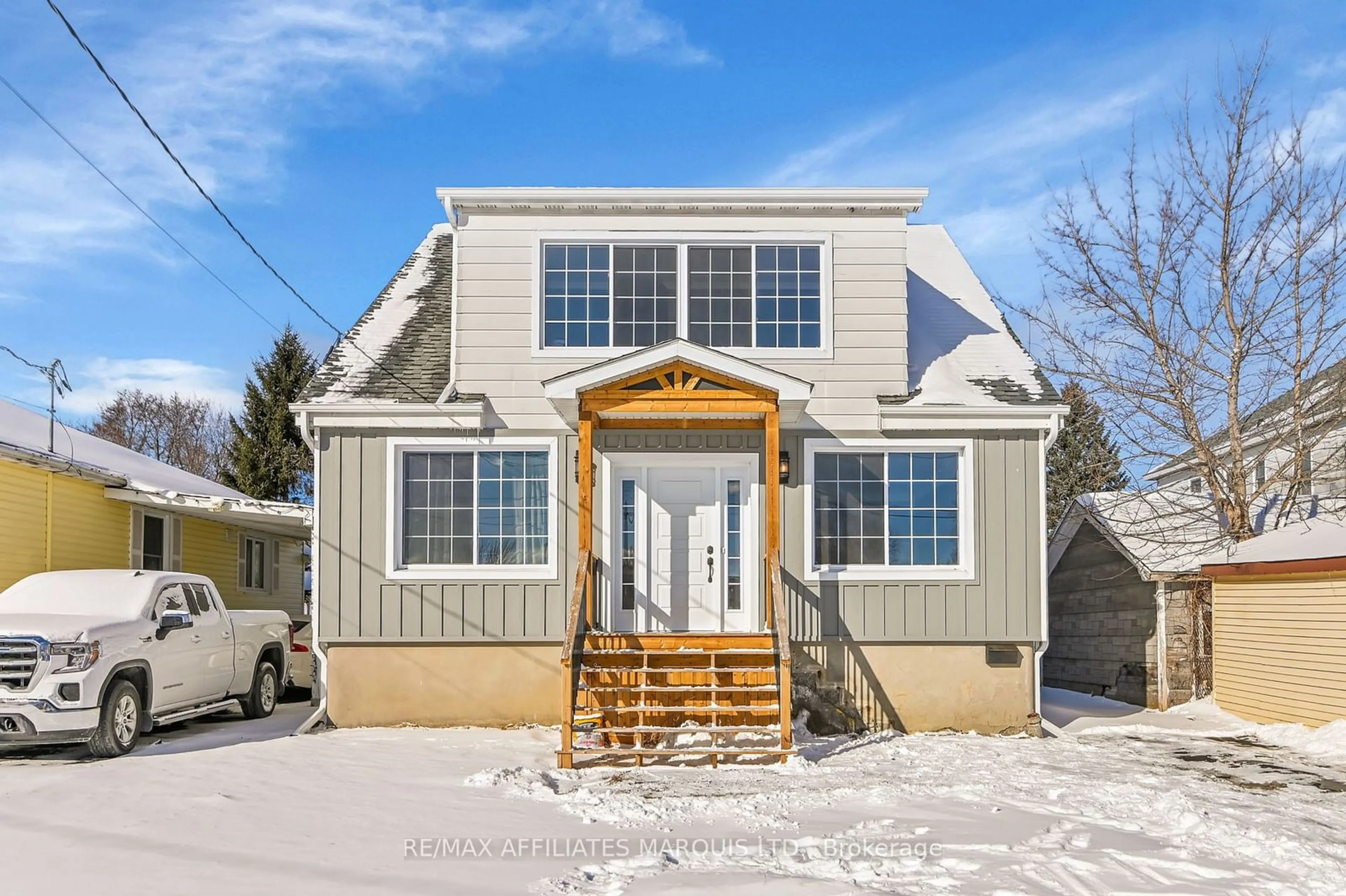 Home with vinyl exterior material, street for 2 Claude Ave, Cornwall Ontario K6H 2K8