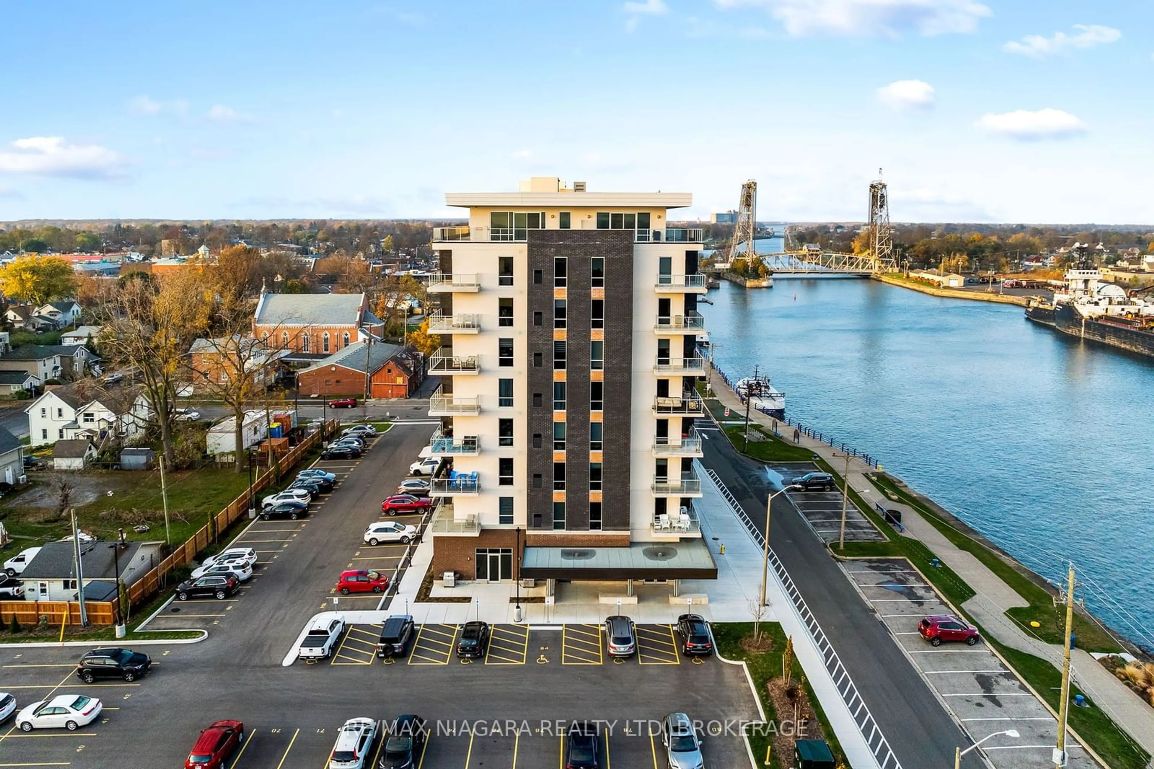 A pic from outside/outdoor area/front of a property/back of a property/a pic from drone, water/lake/river/ocean view for 118 West St #502, Port Colborne Ontario L3K 4C9