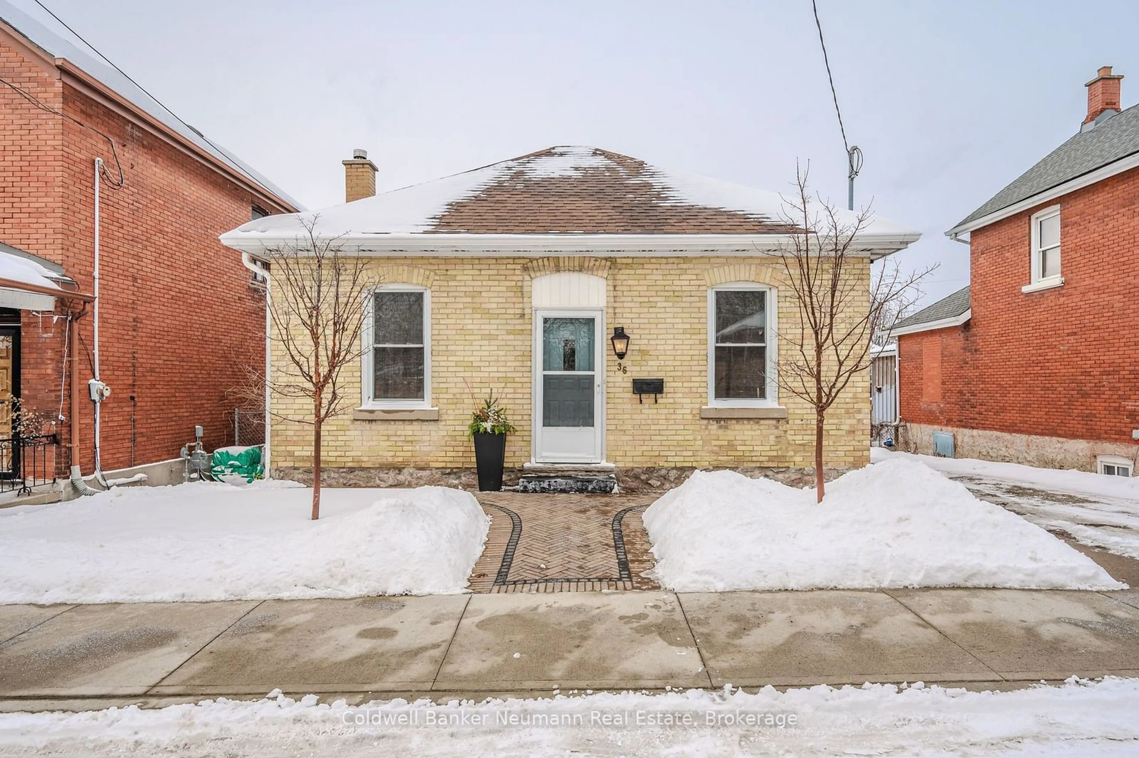 Home with brick exterior material, street for 36 Manitoba St, Guelph Ontario N1E 3B9