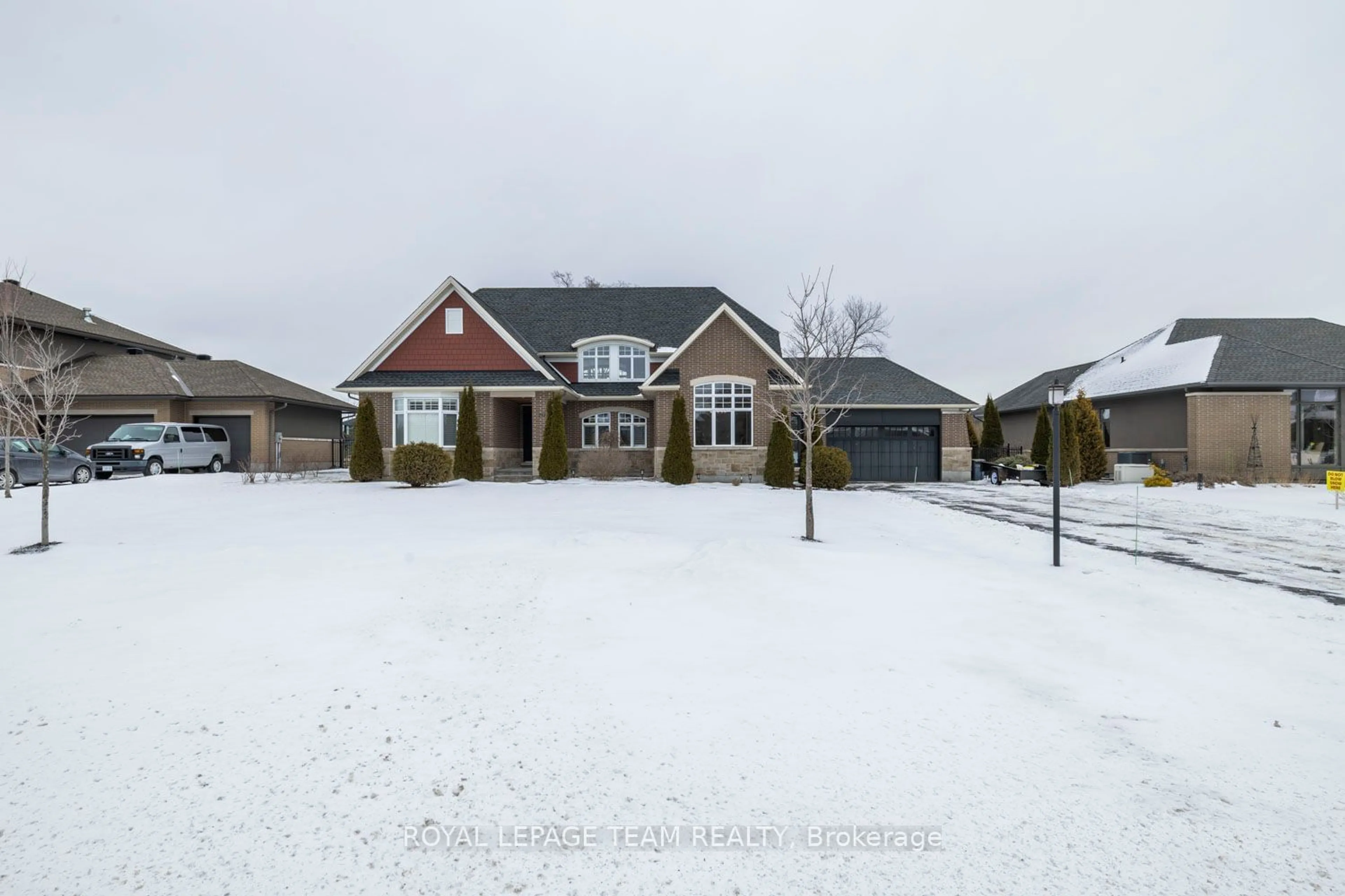 A pic from outside/outdoor area/front of a property/back of a property/a pic from drone, street for 213 CABRELLE Pl, Manotick - Kars - Rideau Twp and Area Ontario K4M 0A9