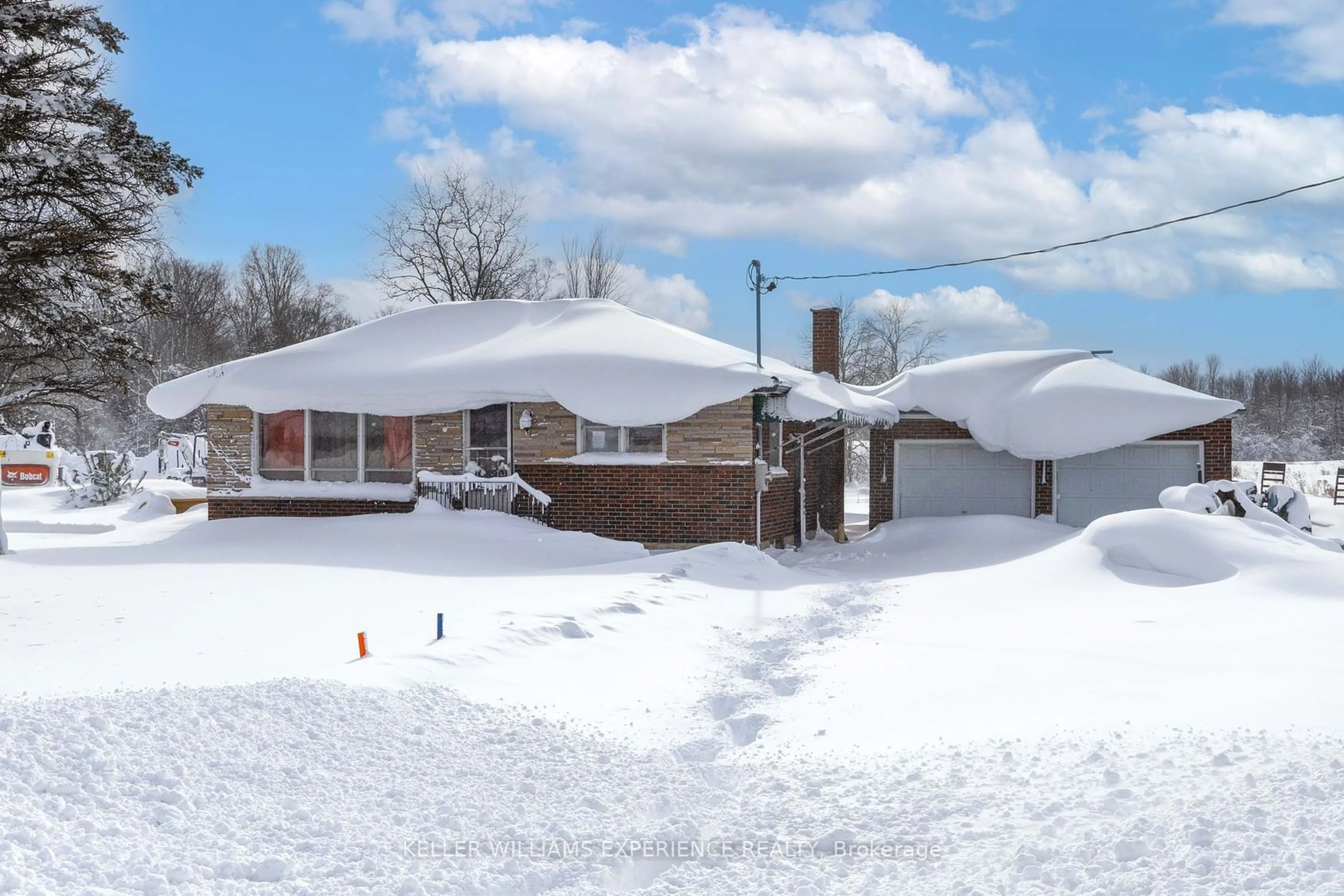 A pic from outside/outdoor area/front of a property/back of a property/a pic from drone, street for 202262 HWY 21, Owen Sound Ontario N4K 5N7