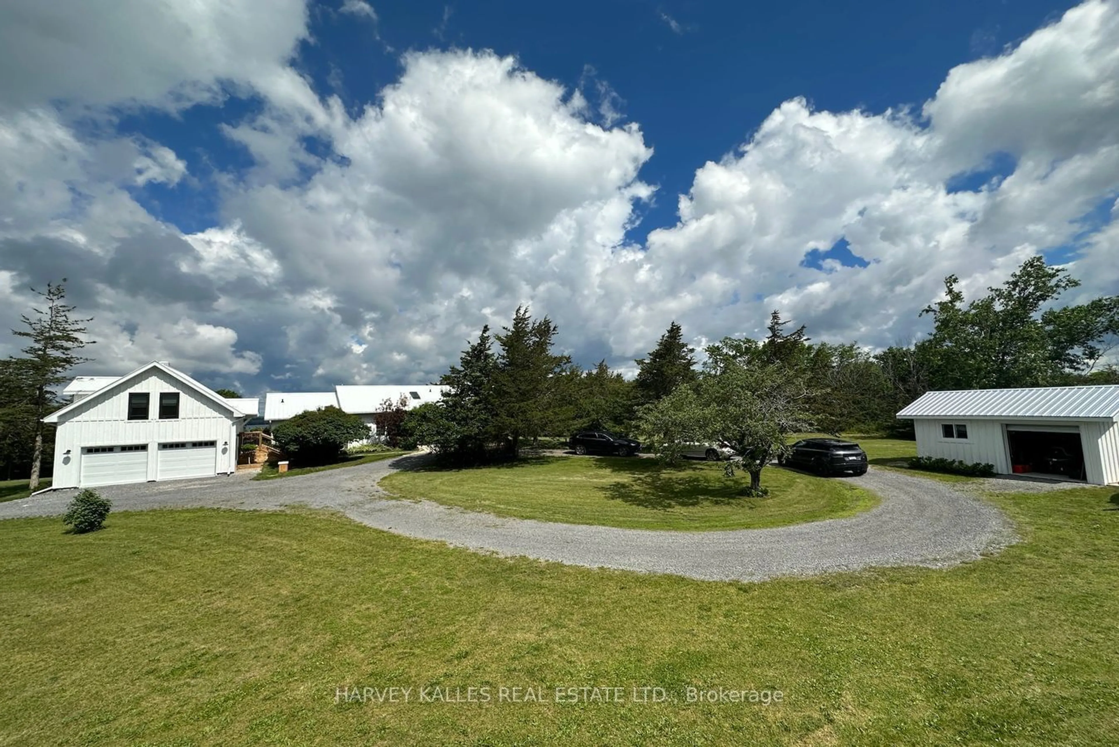 A pic from outside/outdoor area/front of a property/back of a property/a pic from drone, mountain view for 2992 County Rd 7 Rd, Prince Edward County Ontario K0K 2T0