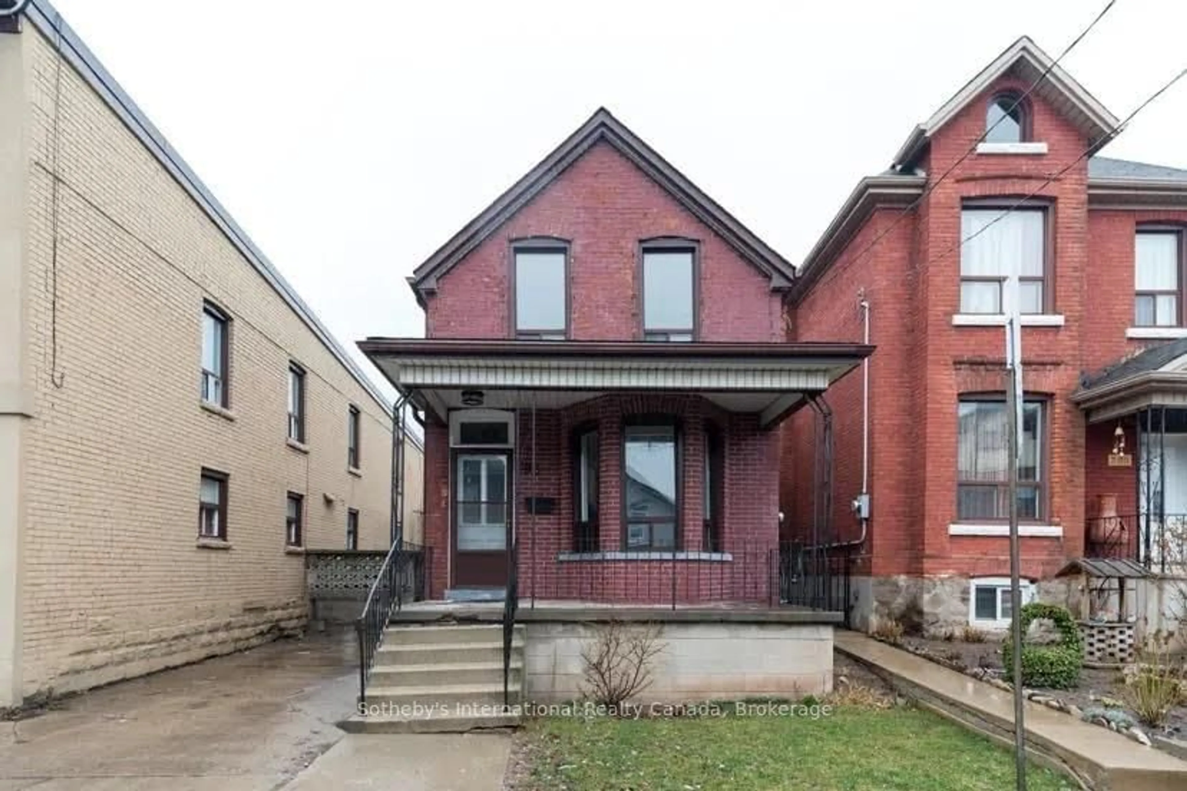 Home with brick exterior material, street for 283 Emerald St, Hamilton Ontario L8L 5L2