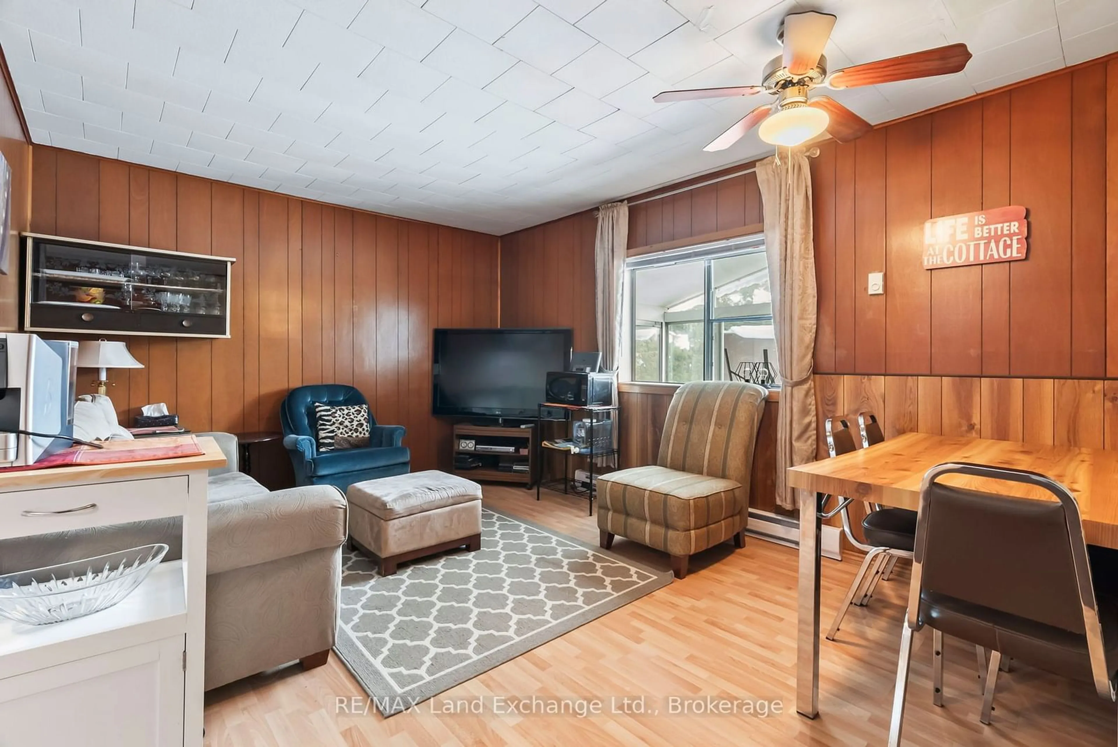 Living room with furniture, wood/laminate floor for 22 Southampton Pkwy, South Bruce Peninsula Ontario N0H 2G0