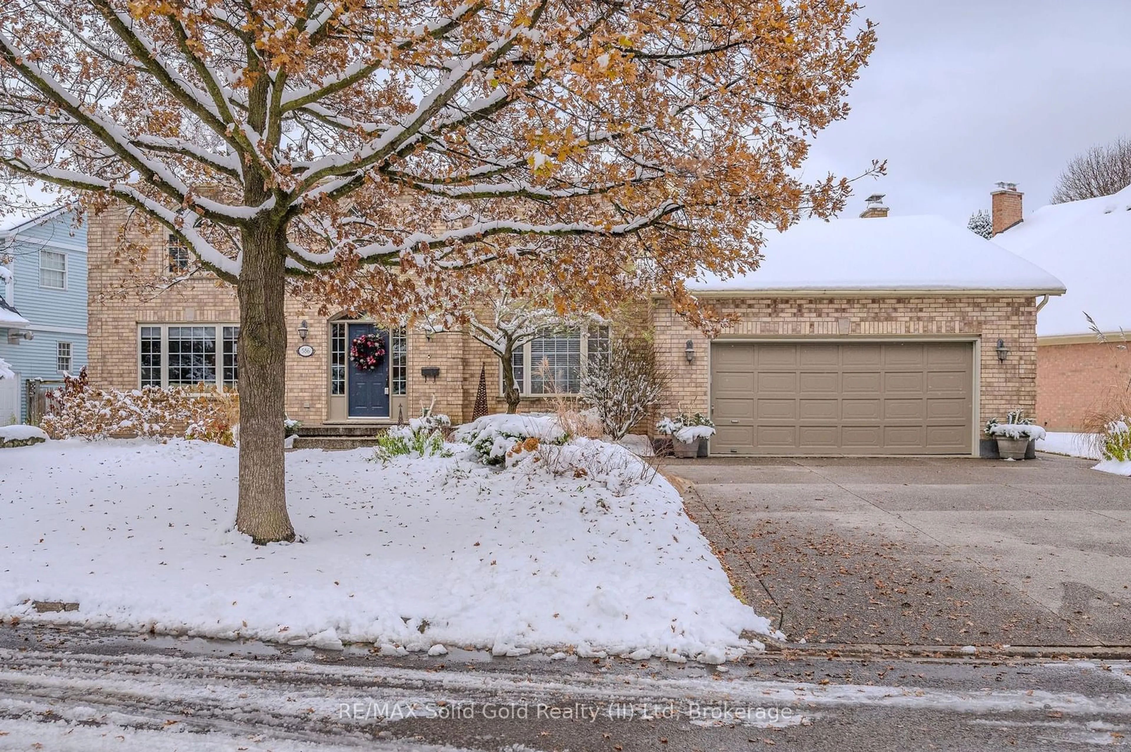 Home with brick exterior material, street for 586 Guildwood Pl, Waterloo Ontario N2K 3M4