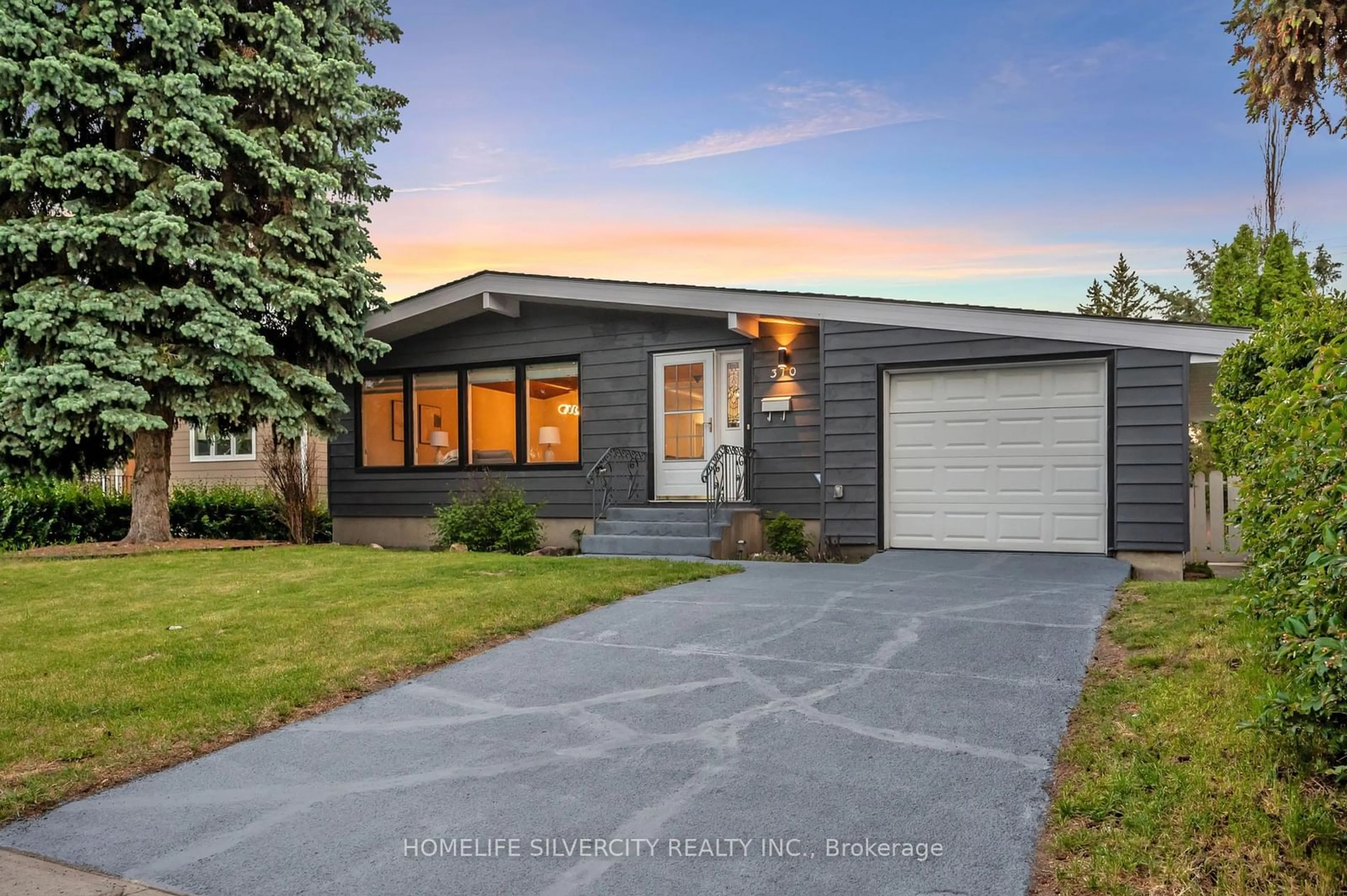 Home with vinyl exterior material, street for 310 Wascana Cres #SE, Out of Area Alberta T2J 1H5