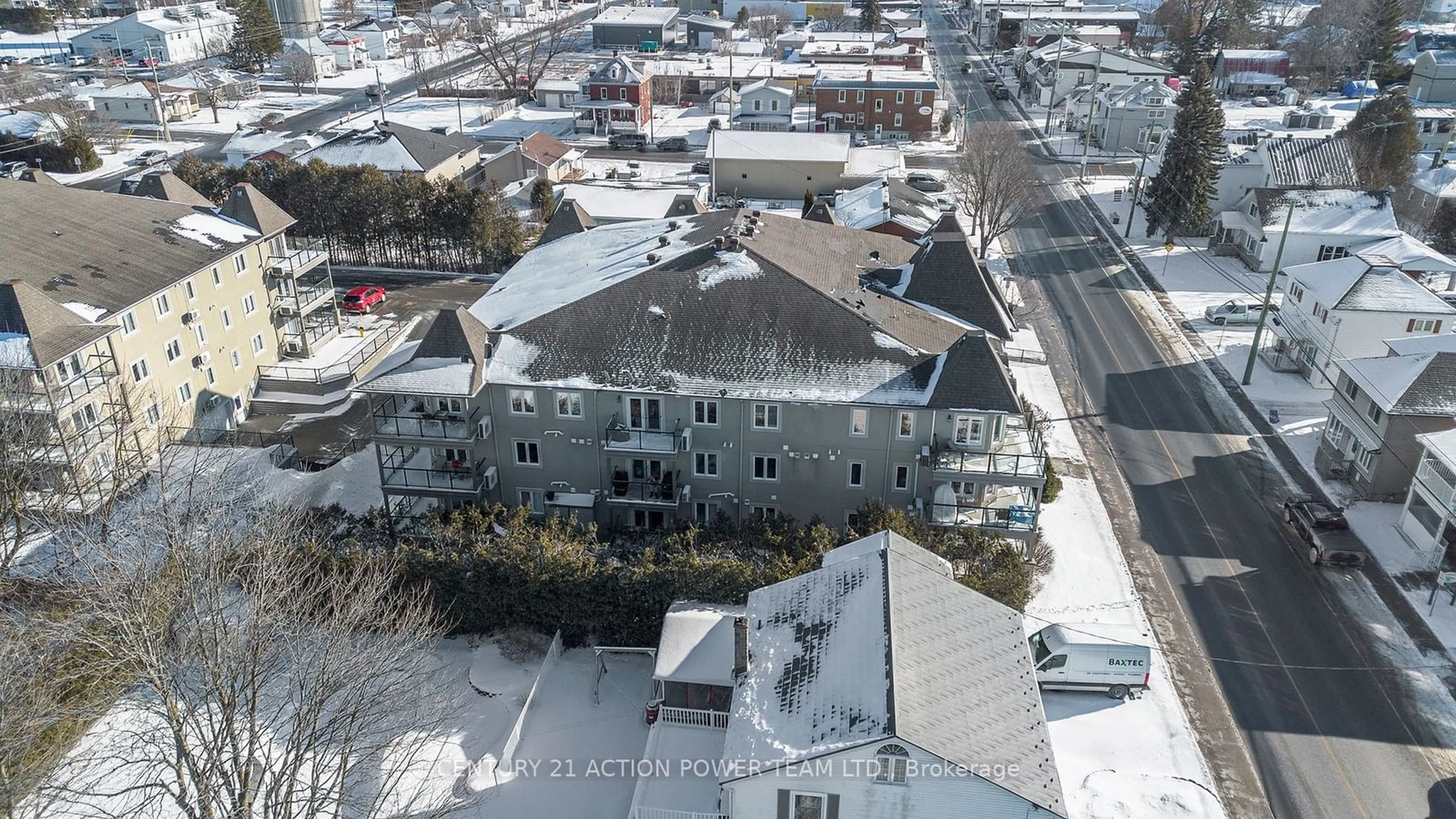 A pic from outside/outdoor area/front of a property/back of a property/a pic from drone, unknown for 770 Principale St #303, Casselman Ontario K0A 1M0