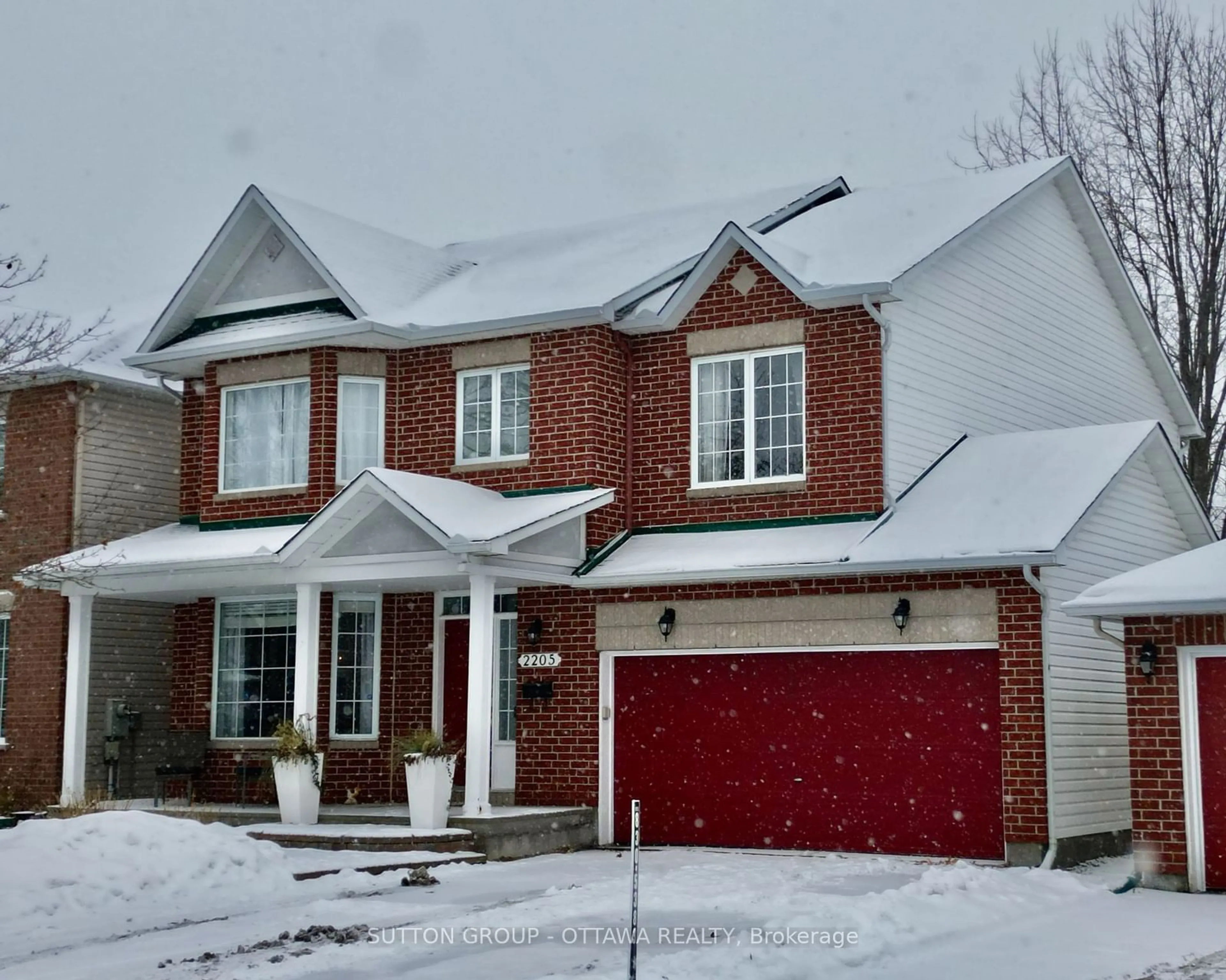 Home with brick exterior material, street for 2205 Blue Willow Cres, Orleans - Convent Glen and Area Ontario K1W 1K6