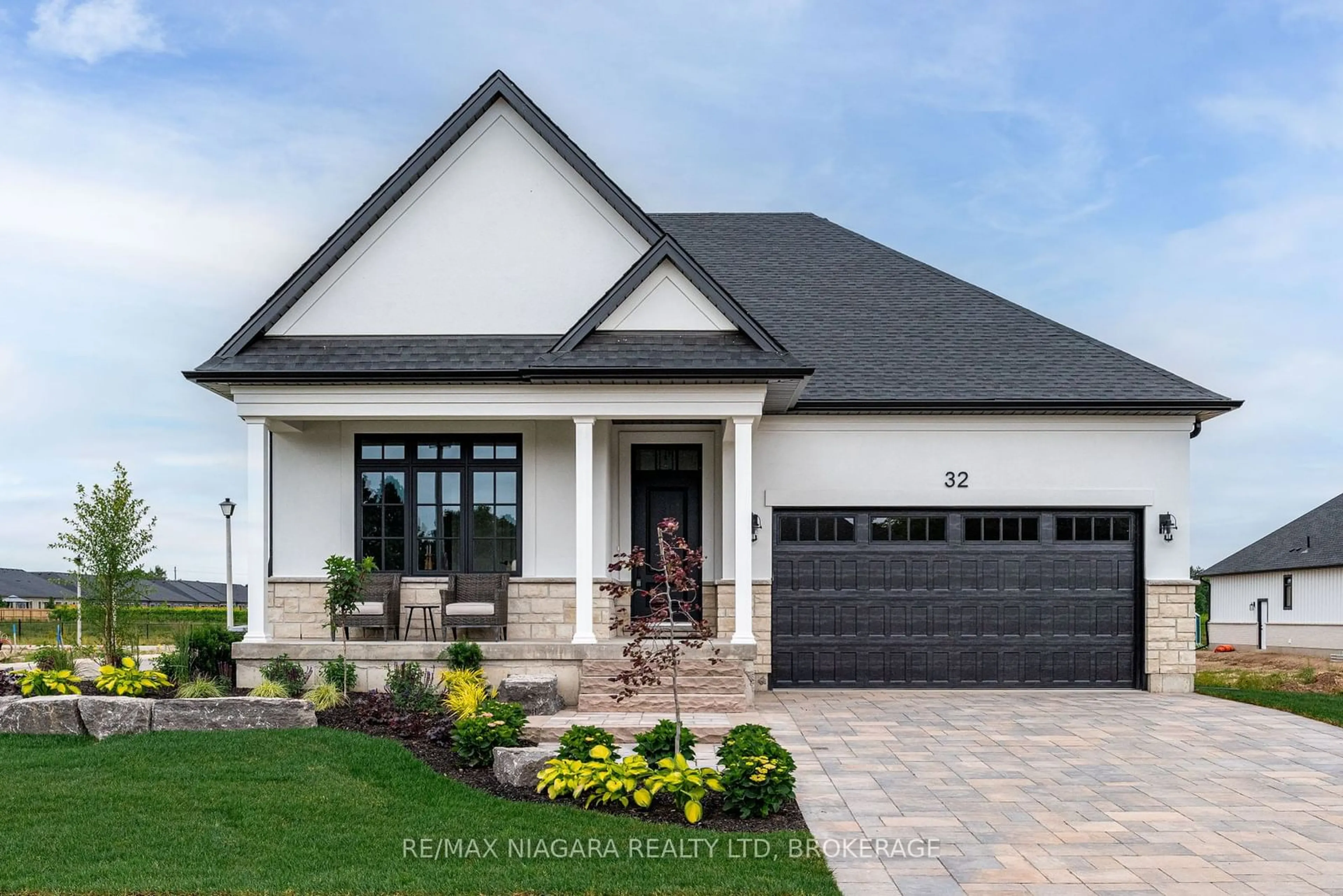 Home with brick exterior material, street for 32 Harvest Dr, Niagara-on-the-Lake Ontario L0S 1J0