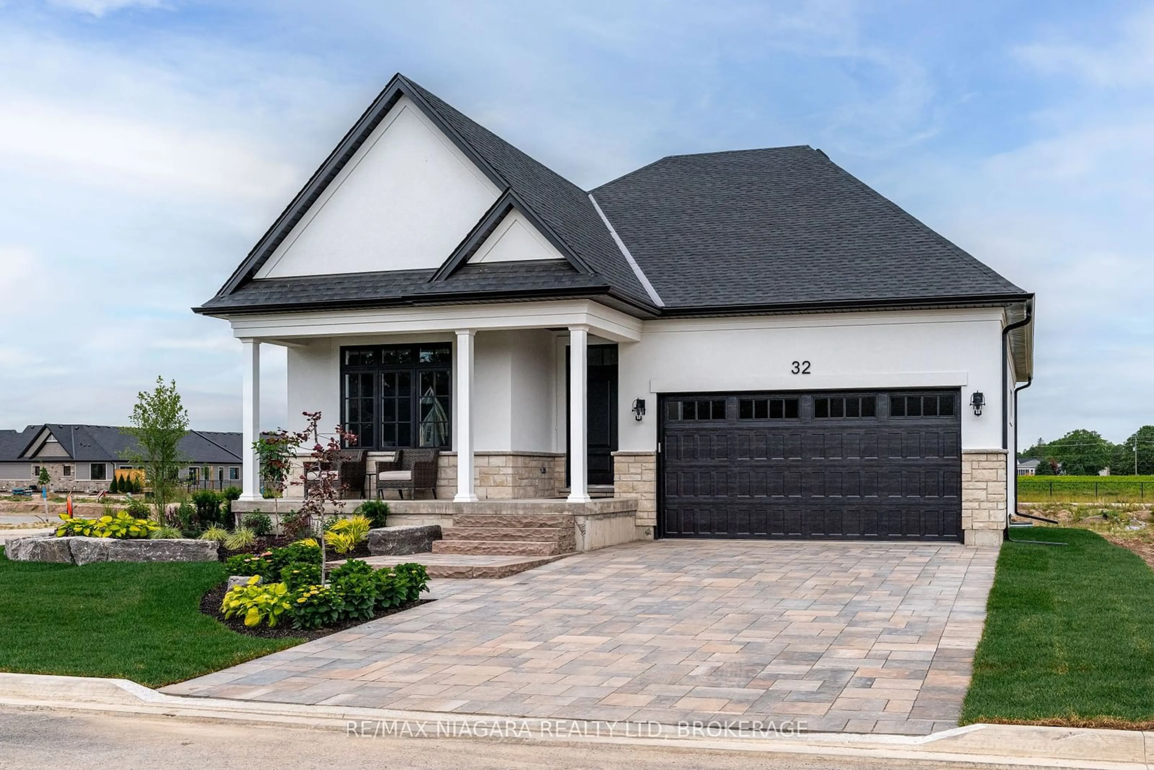 Home with brick exterior material, street for 32 Harvest Dr, Niagara-on-the-Lake Ontario L0S 1J0