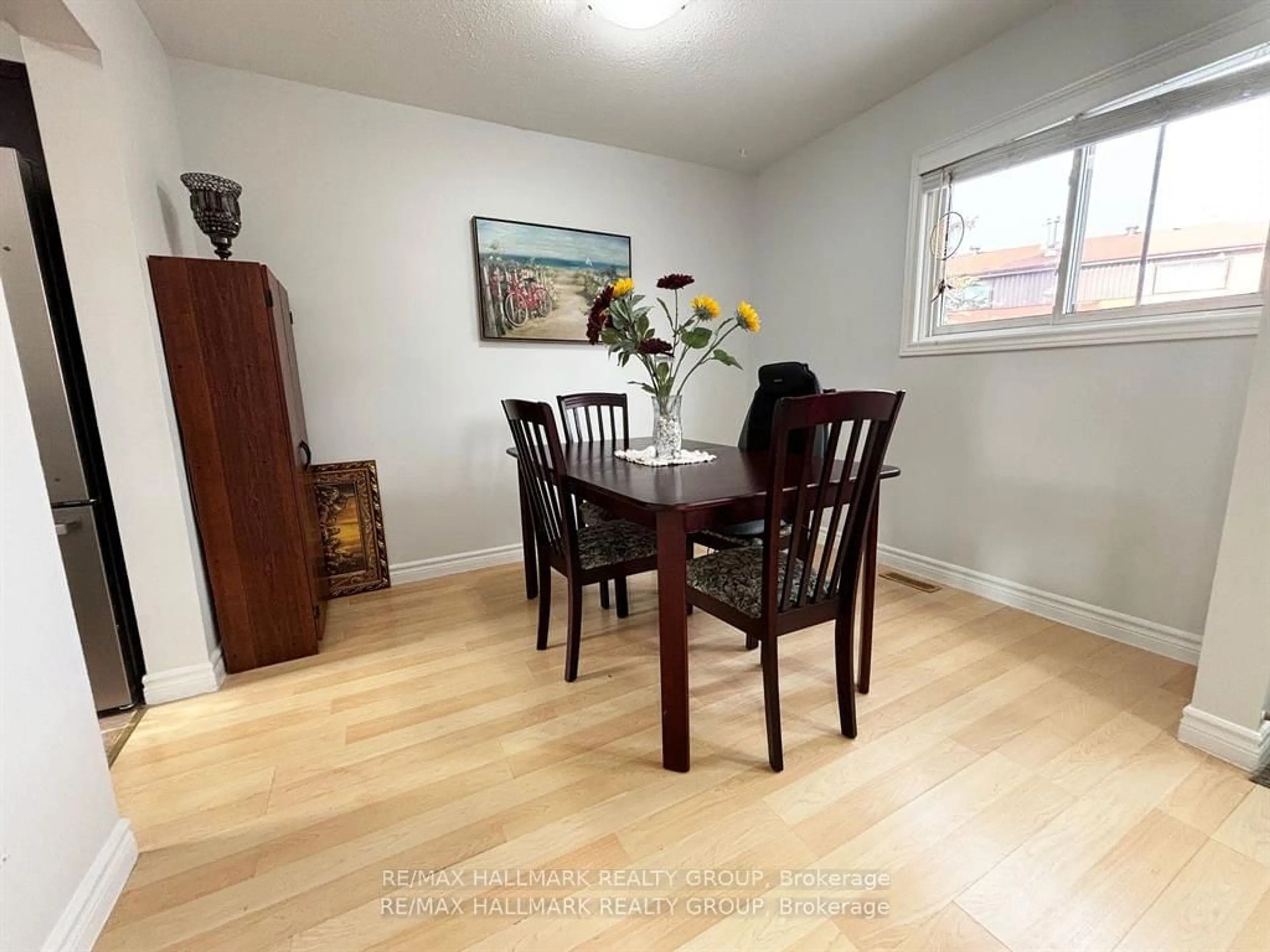 Dining room, wood/laminate floor for 56D Foxfield Dr #29, Barrhaven Ontario K2J 1P7