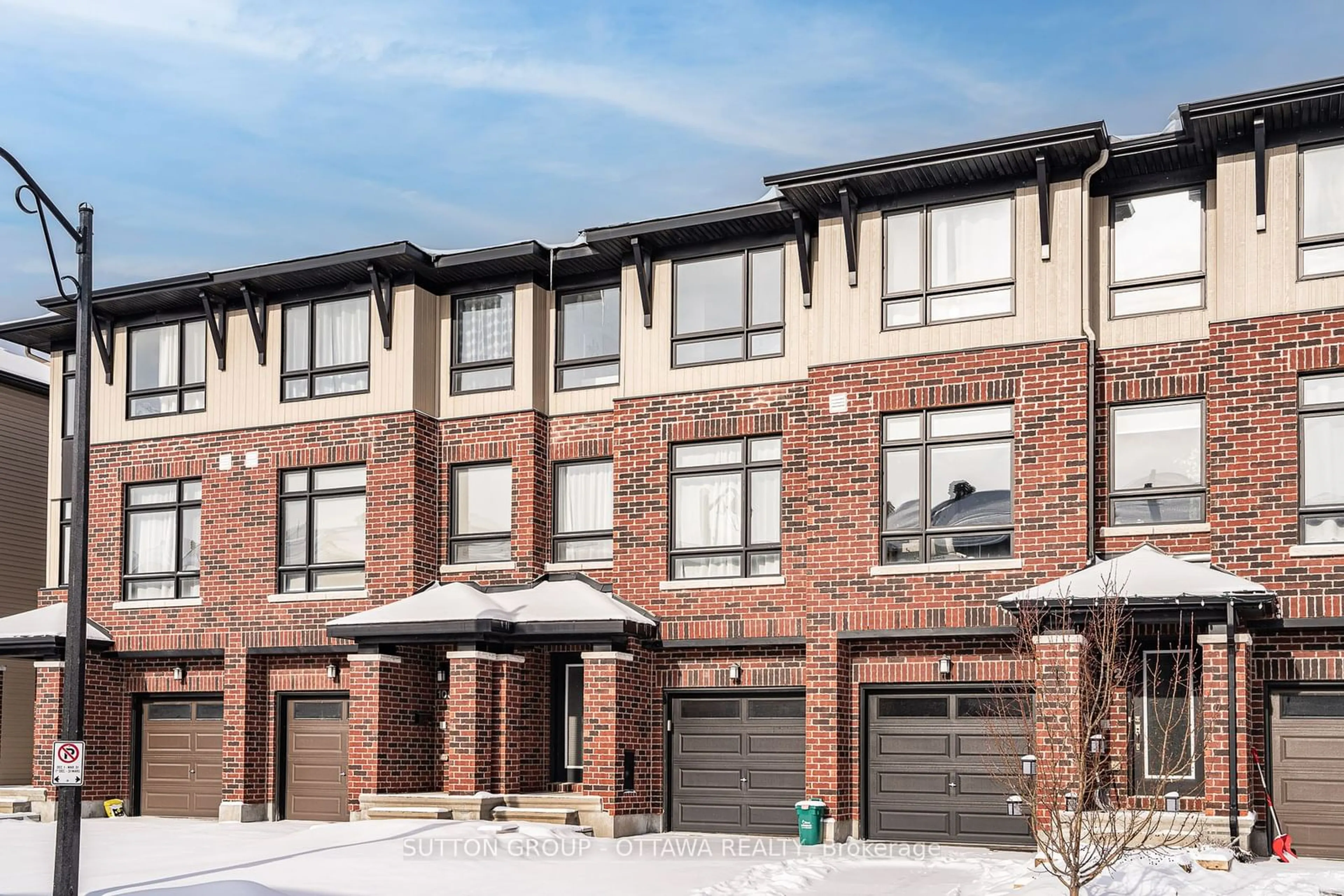 Home with brick exterior material, street for 104 Wild Senna Way, Barrhaven Ontario K2J 5Z7