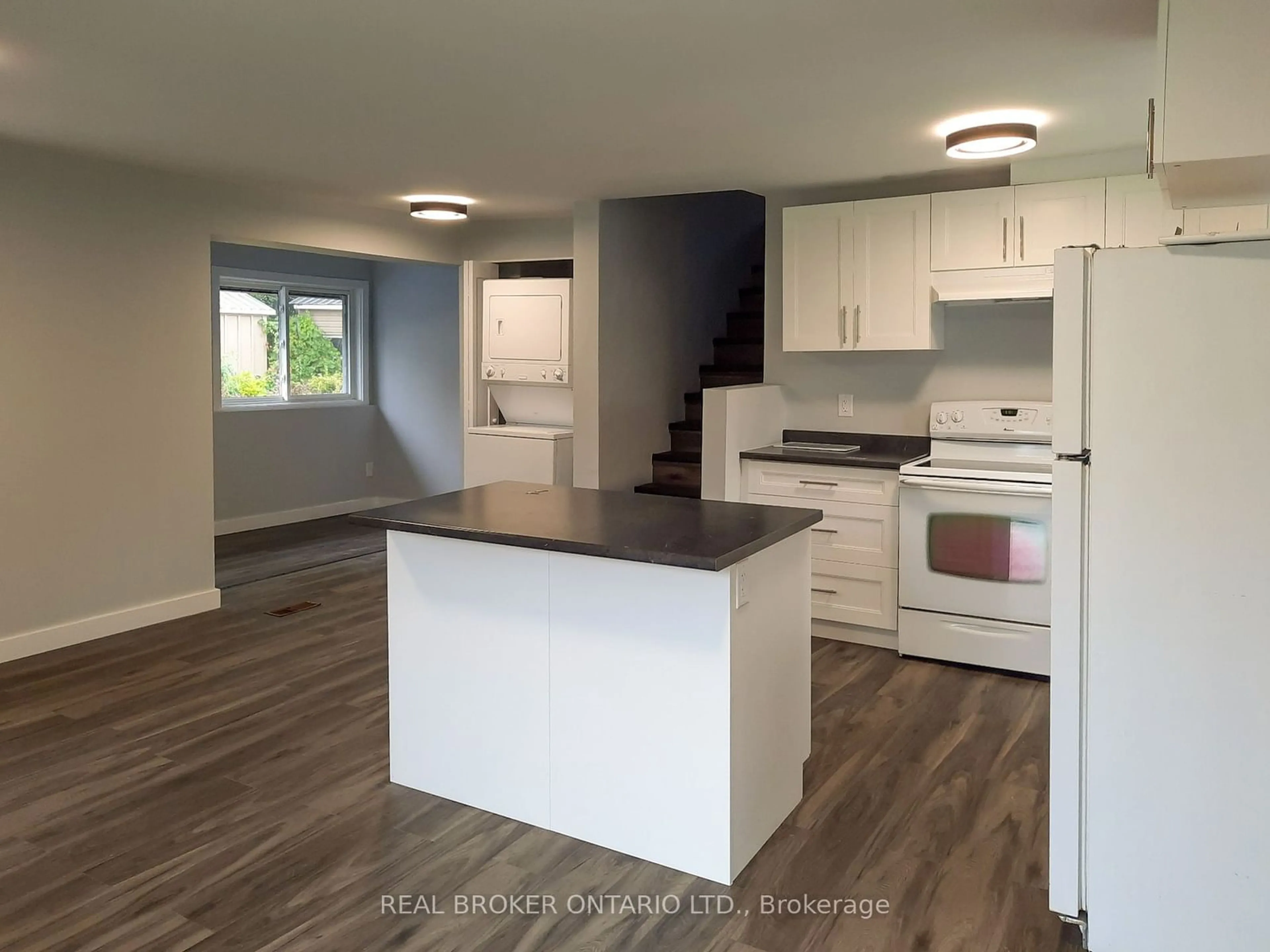 Open concept kitchen, wood/laminate floor for 7420 Roger Stevens Dr, Montague Ontario K7A 4S6