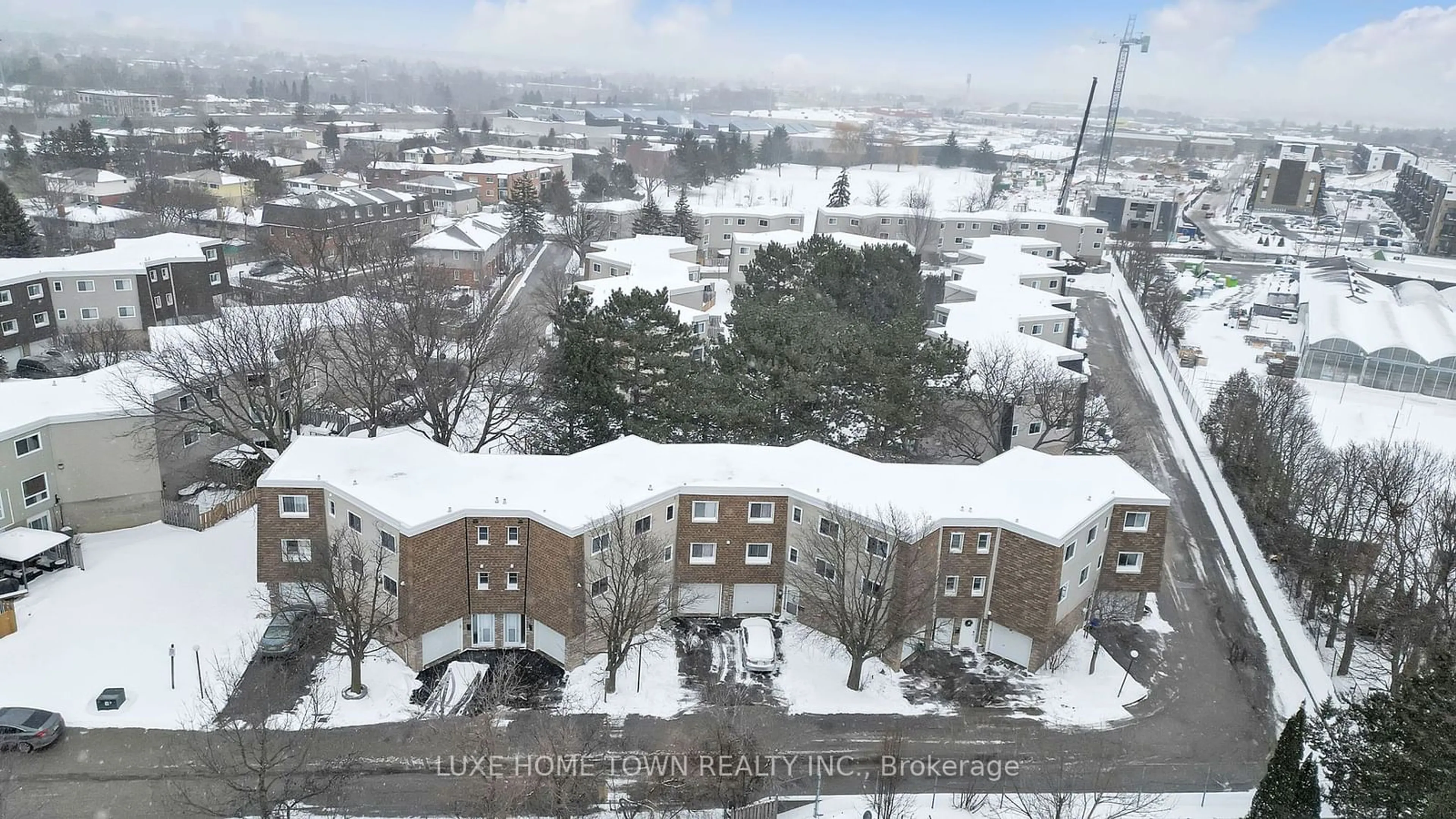 A pic from outside/outdoor area/front of a property/back of a property/a pic from drone, city buildings view from balcony for 60 Elmsdale Dr #46, Kitchener Ontario N2E 2G4