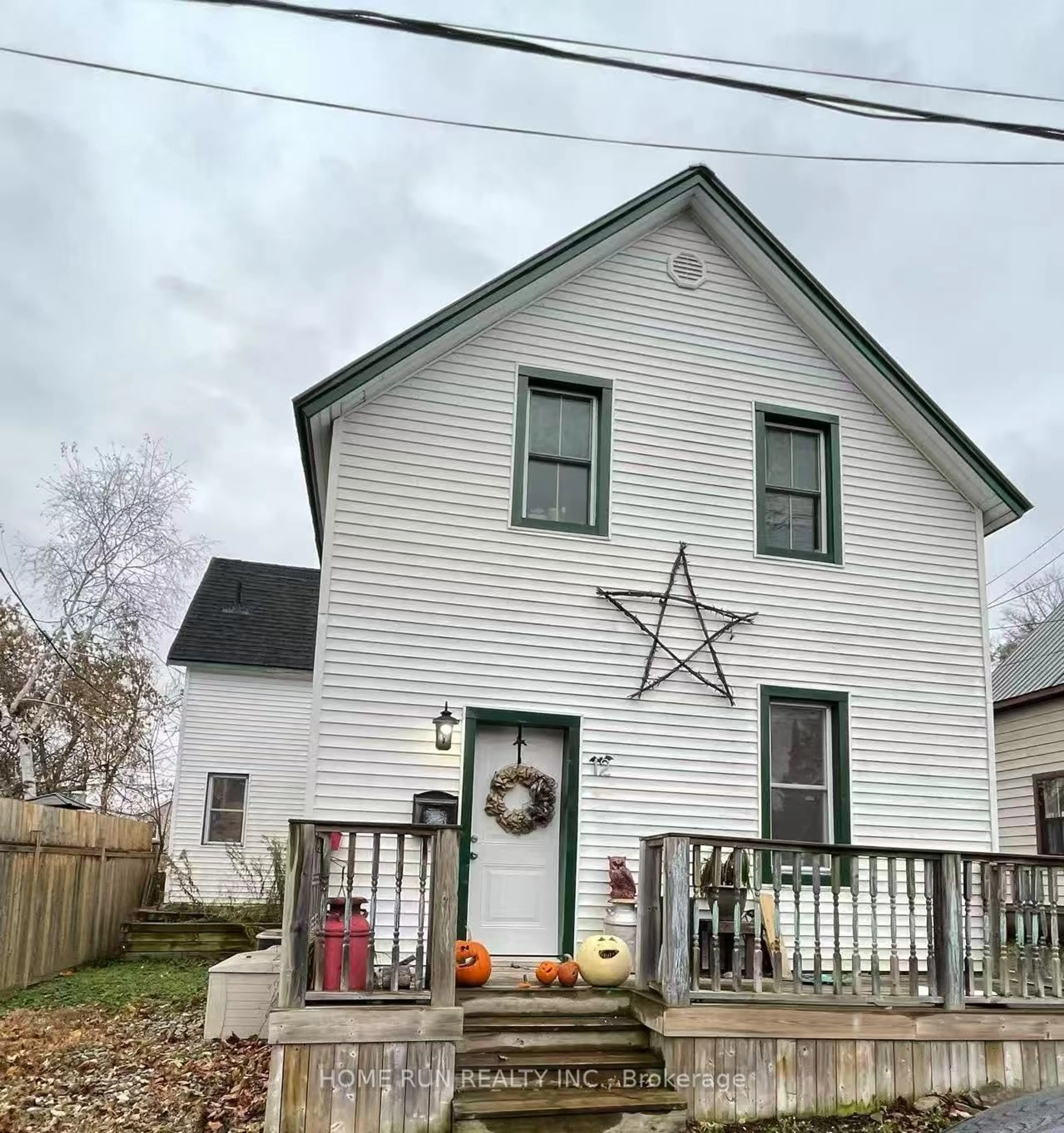 Home with vinyl exterior material, street for 12 Herriott St, Carleton Place Ontario K7C 2A5