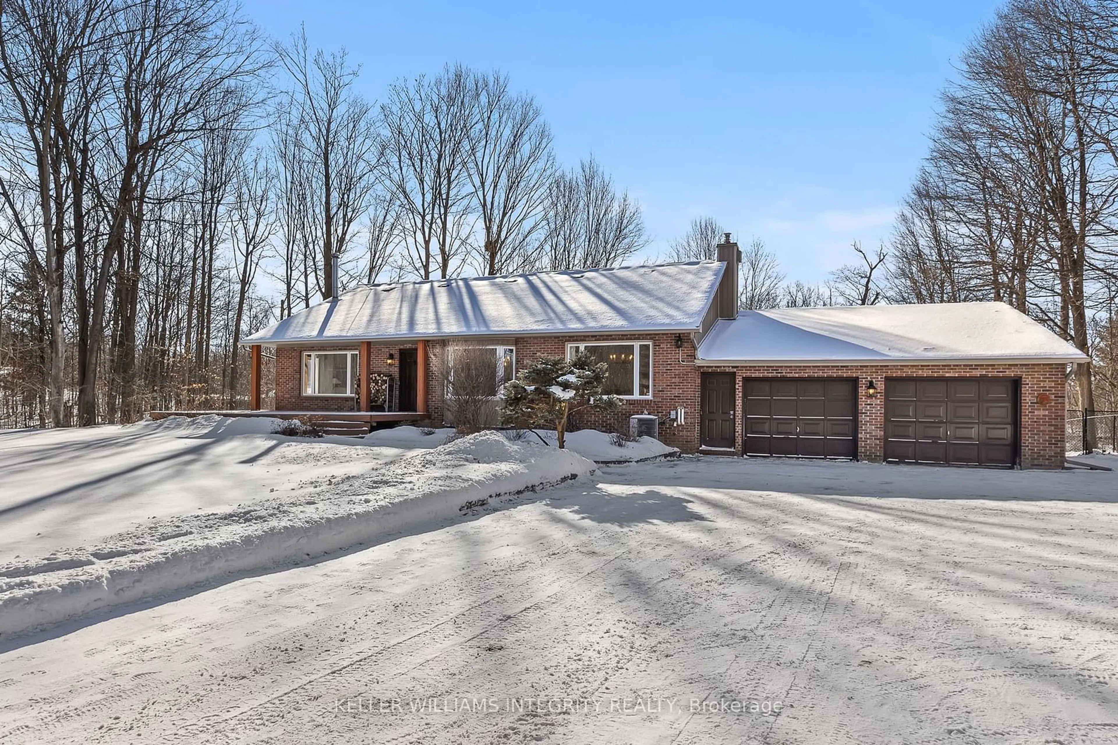 Home with brick exterior material, street for 1437 Huntmar Dr, Carp - Huntley Ward Ontario K0A 1L0