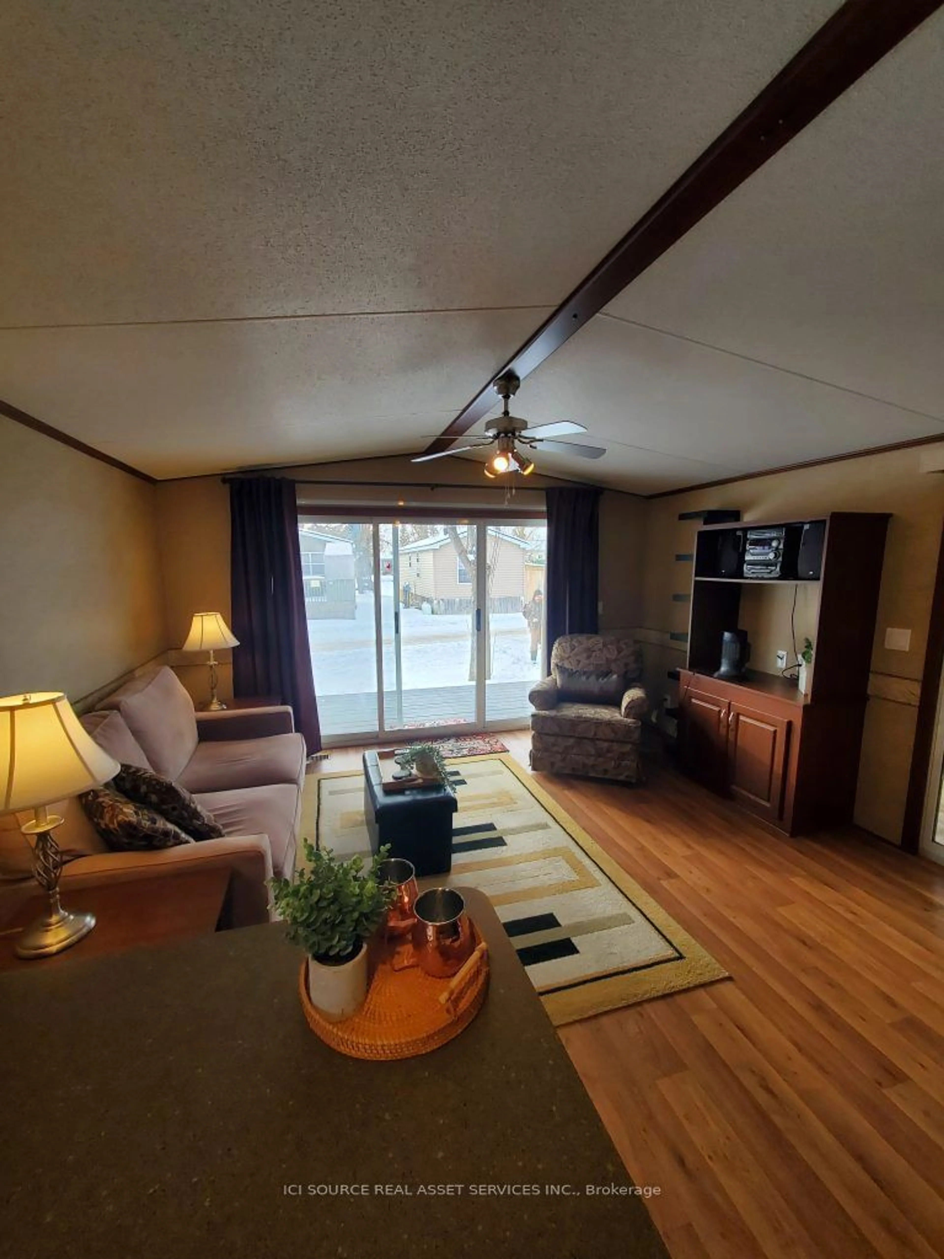 Living room with furniture, wood/laminate floor for 171 Woodland Estates Rd #BWD020, Trent Hills Ontario K0L 1L0