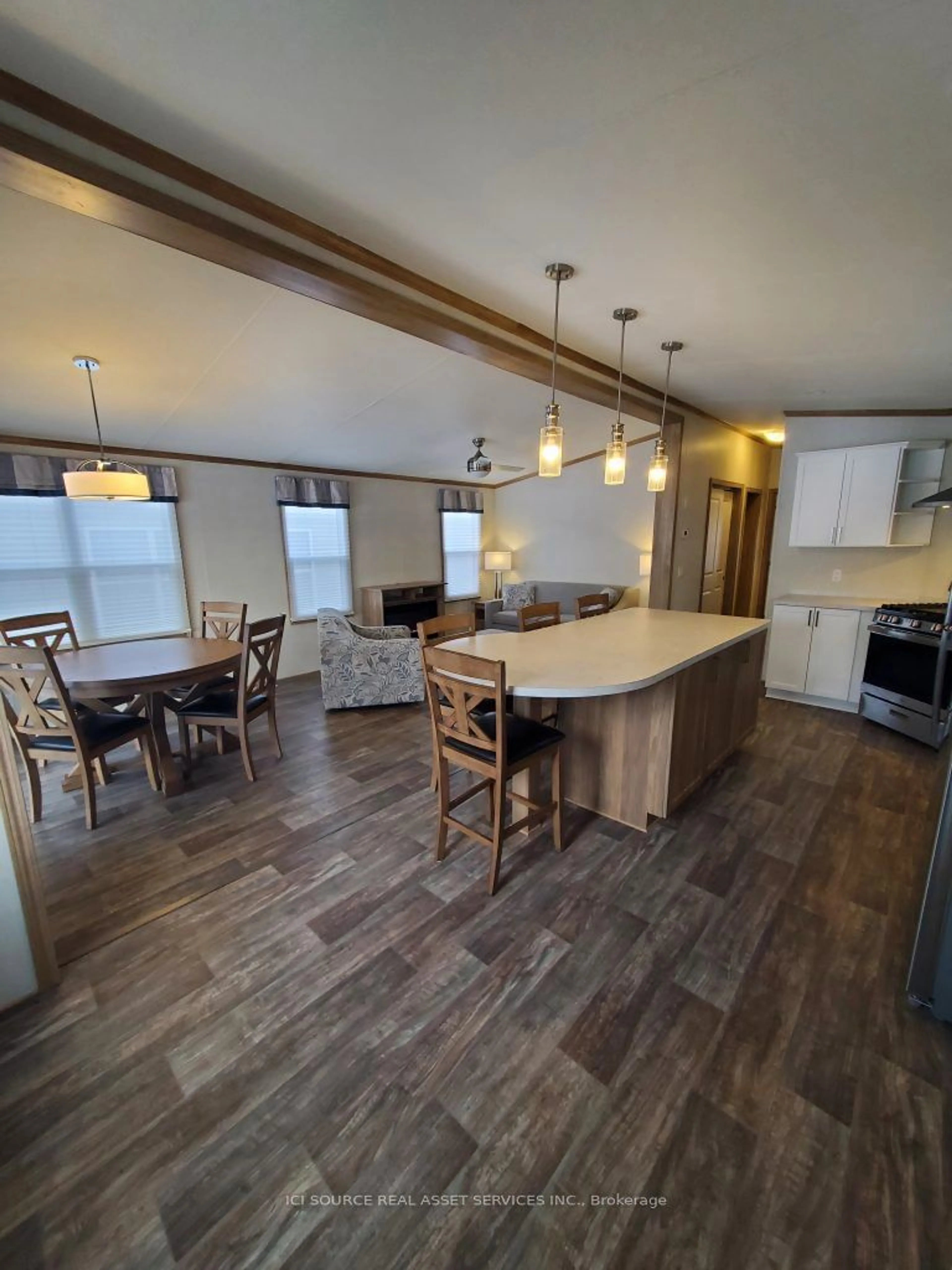 Open concept kitchen, wood/laminate floor for 171 Woodland Estates Rd #BWD009, Trent Hills Ontario K0L 1L0