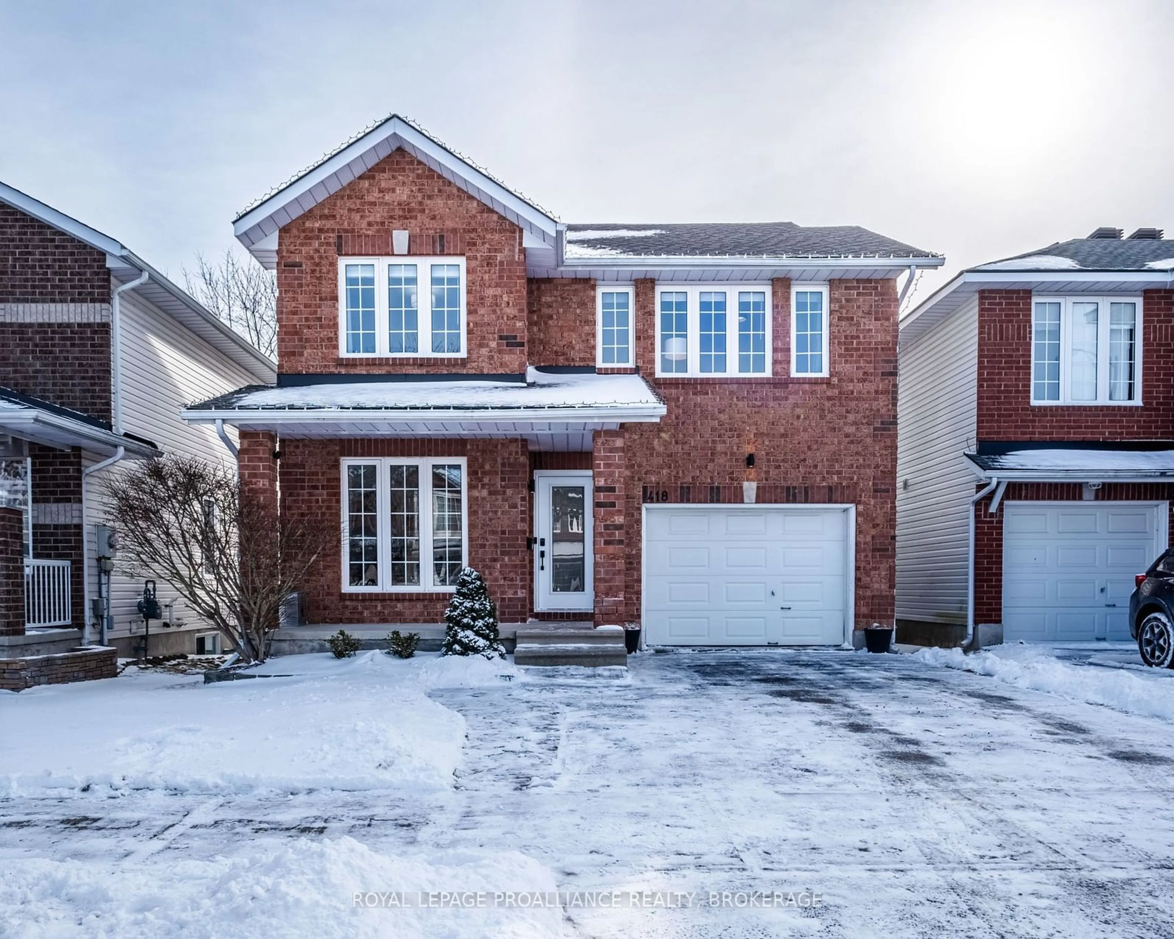 Home with brick exterior material, street for 418 Conservatory Dr, Kingston Ontario K7M 9C7