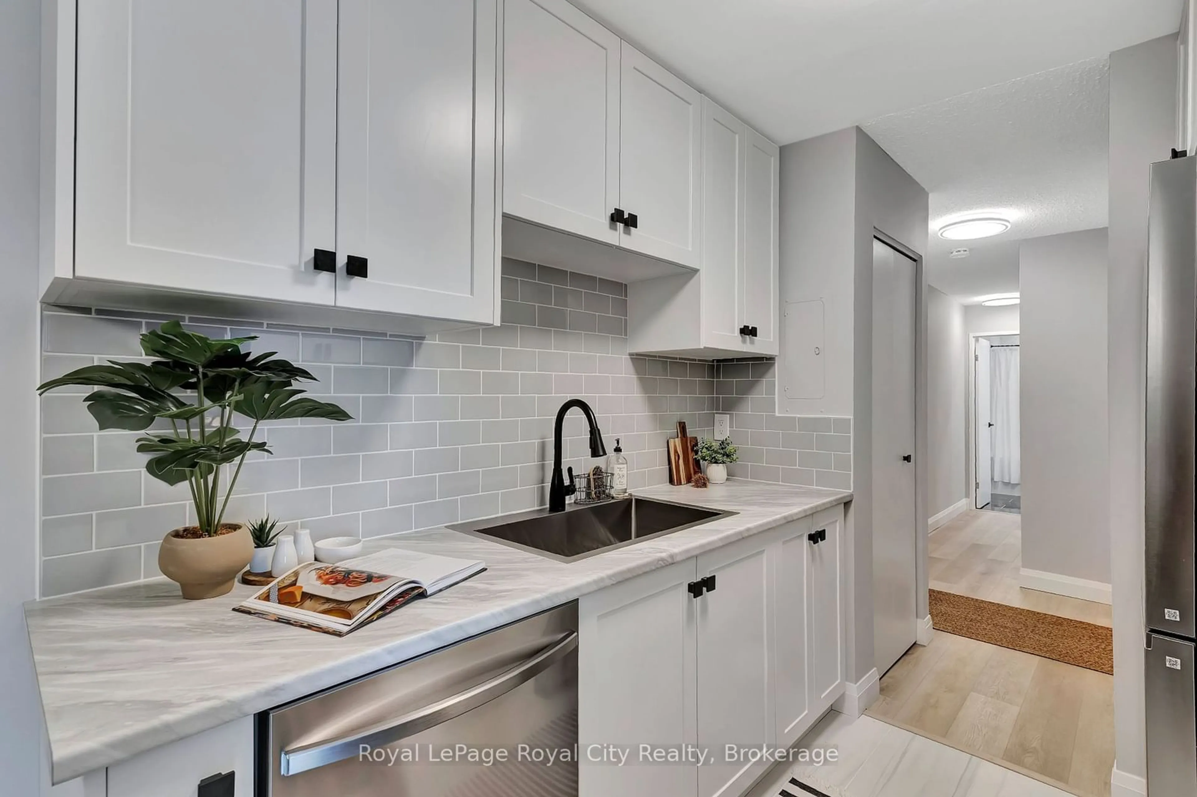 Open concept kitchen, ceramic/tile floor for 234 Willow Rd #202, Guelph Ontario N1H 7C6