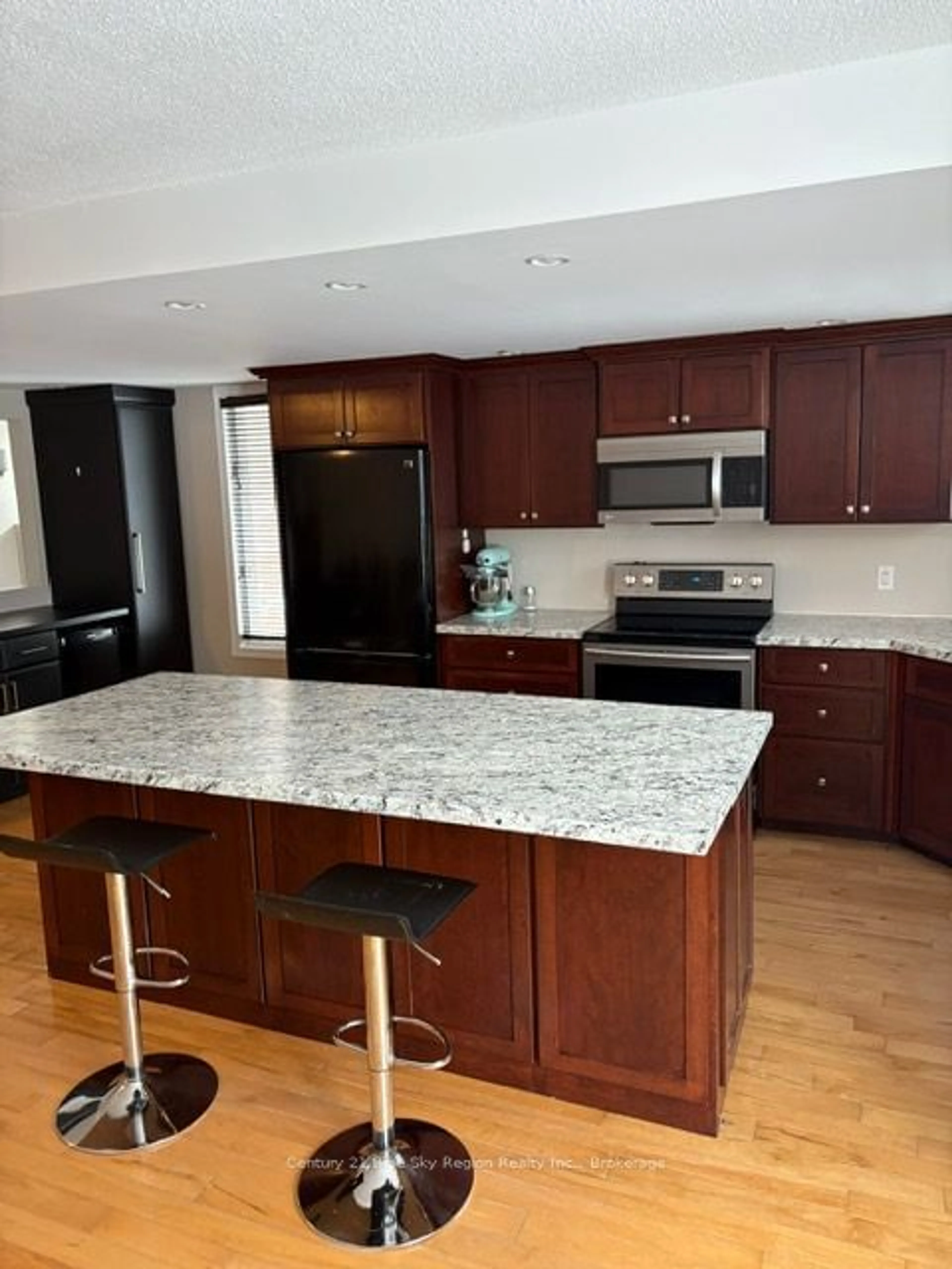 Open concept kitchen, wood/laminate floor for 271 Labreche Dr, North Bay Ontario P1A 4J5