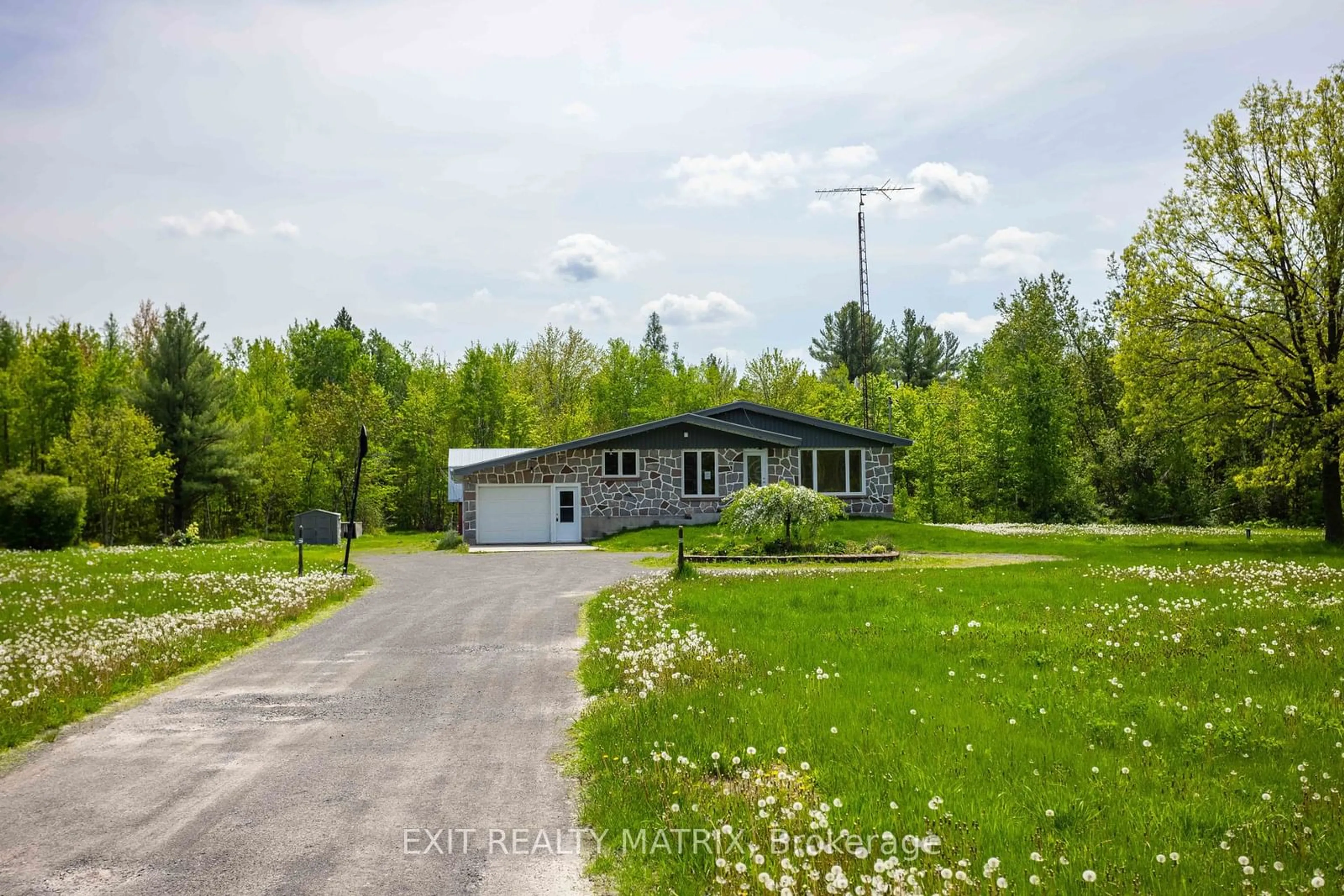 A pic from outside/outdoor area/front of a property/back of a property/a pic from drone, street for 5651 COUNTY RD 17 Rd, Alfred and Plantagenet Ontario K0B 1L0