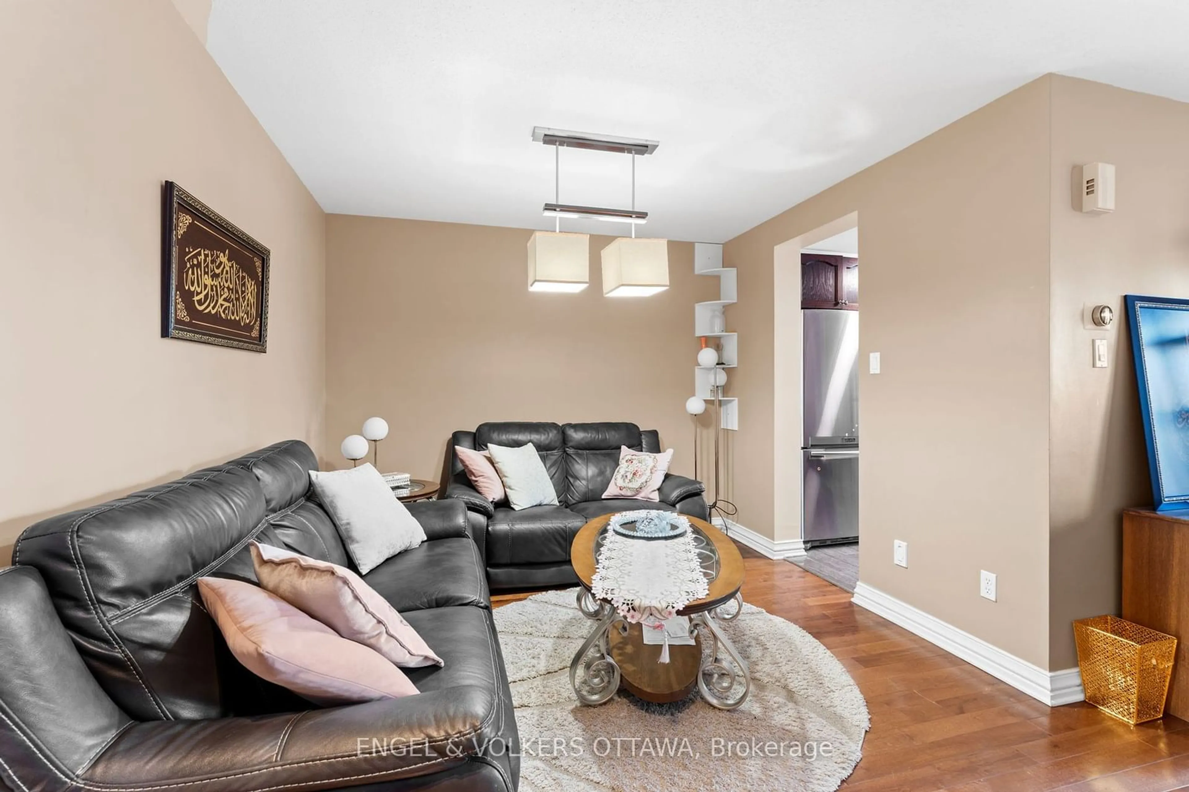 Living room with furniture, wood/laminate floor for 171 Harbour View St, Barrhaven Ontario K2G 7E7