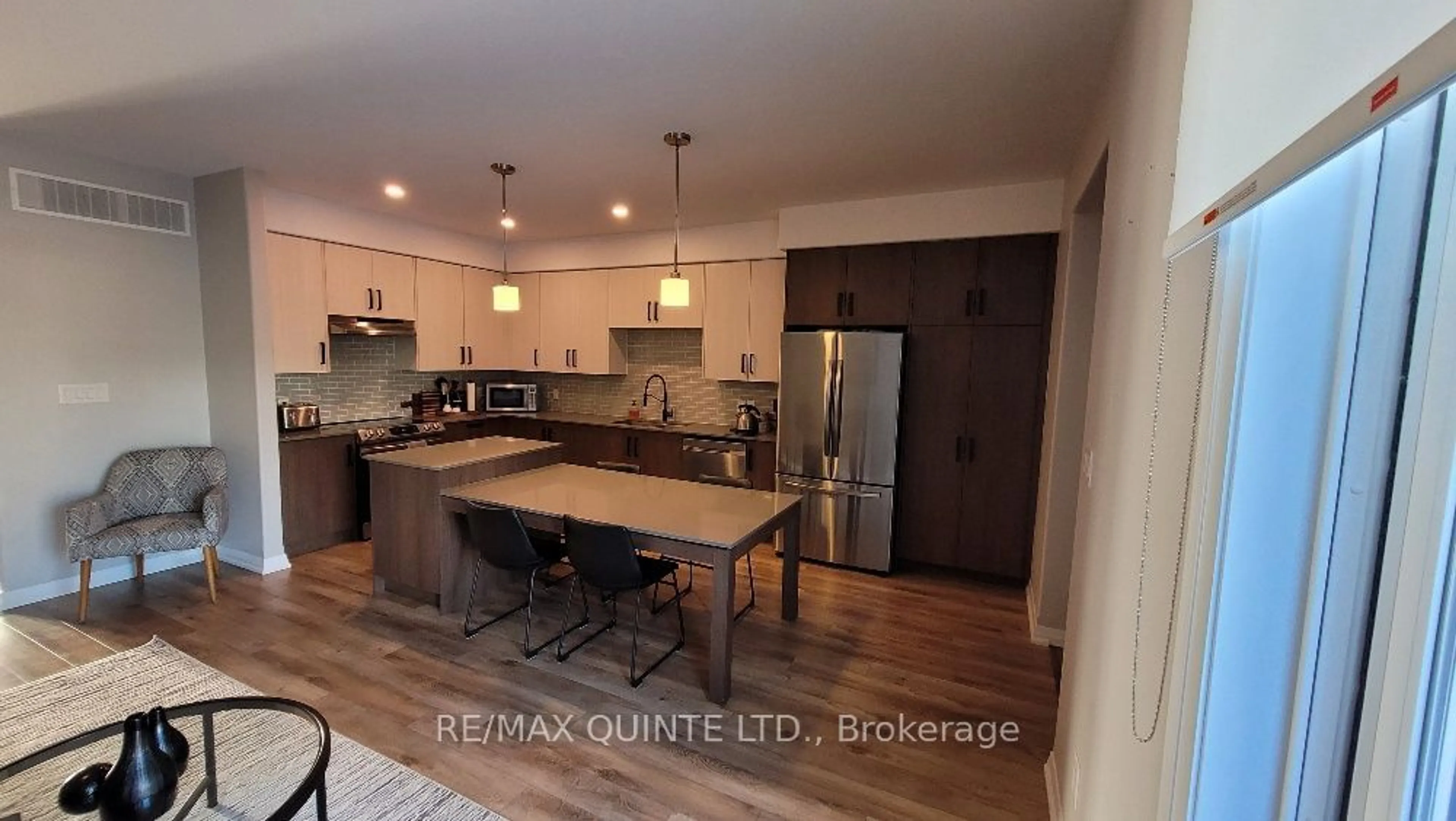 Open concept kitchen, wood/laminate floor for 80 Marsh Ave #10, Peterborough Ontario K9M 0J5