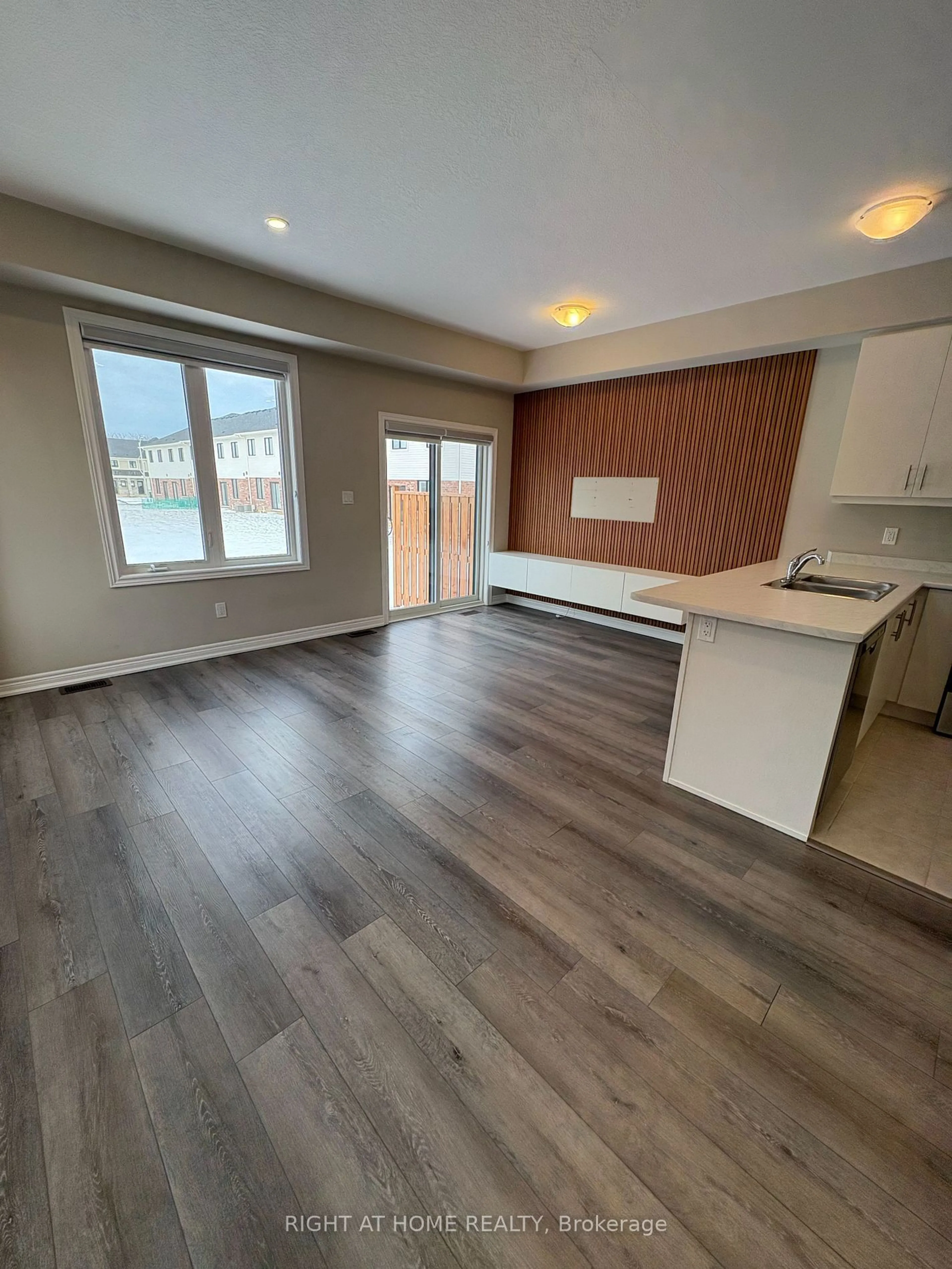 Open concept kitchen, wood/laminate floor for 30 MIA Dr #1, Hamilton Ontario L9B 0K1