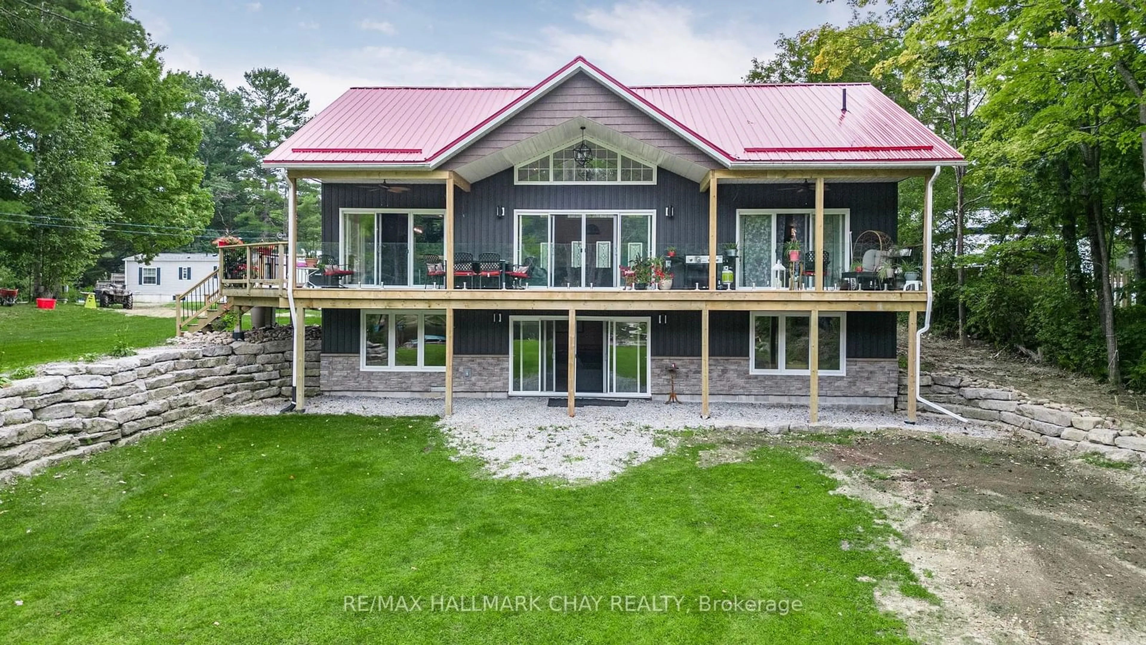 A pic from outside/outdoor area/front of a property/back of a property/a pic from drone, building for 7544 Highway 35, Kawartha Lakes Ontario K0M 2L0