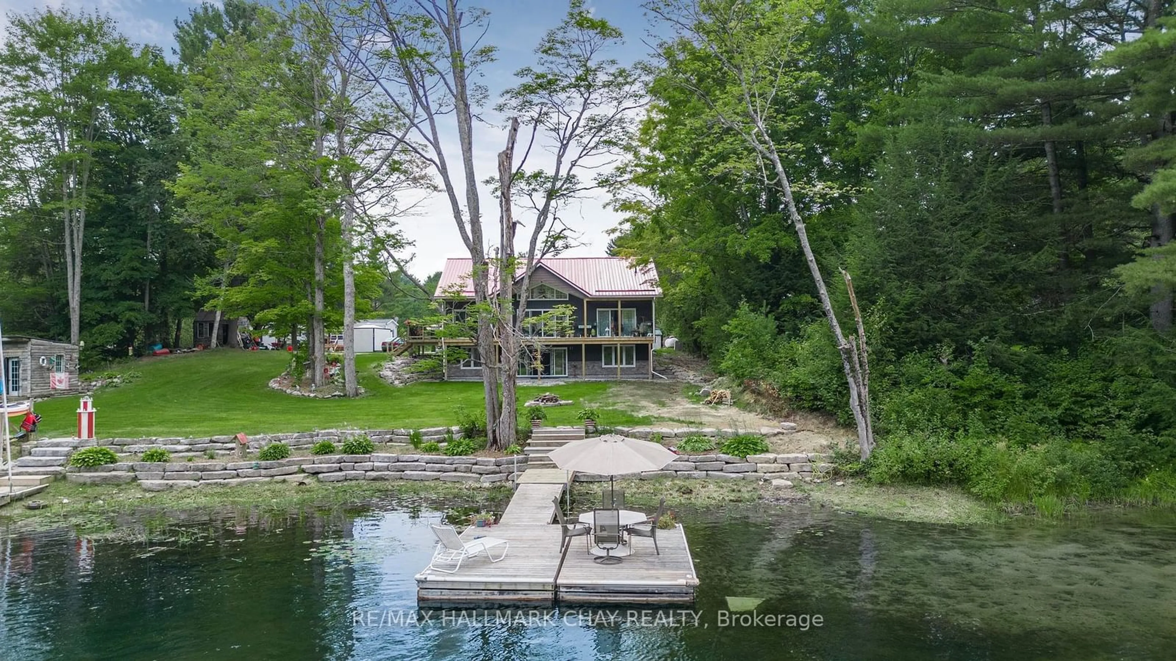 A pic from outside/outdoor area/front of a property/back of a property/a pic from drone, water/lake/river/ocean view for 7544 Highway 35, Kawartha Lakes Ontario K0M 2L0