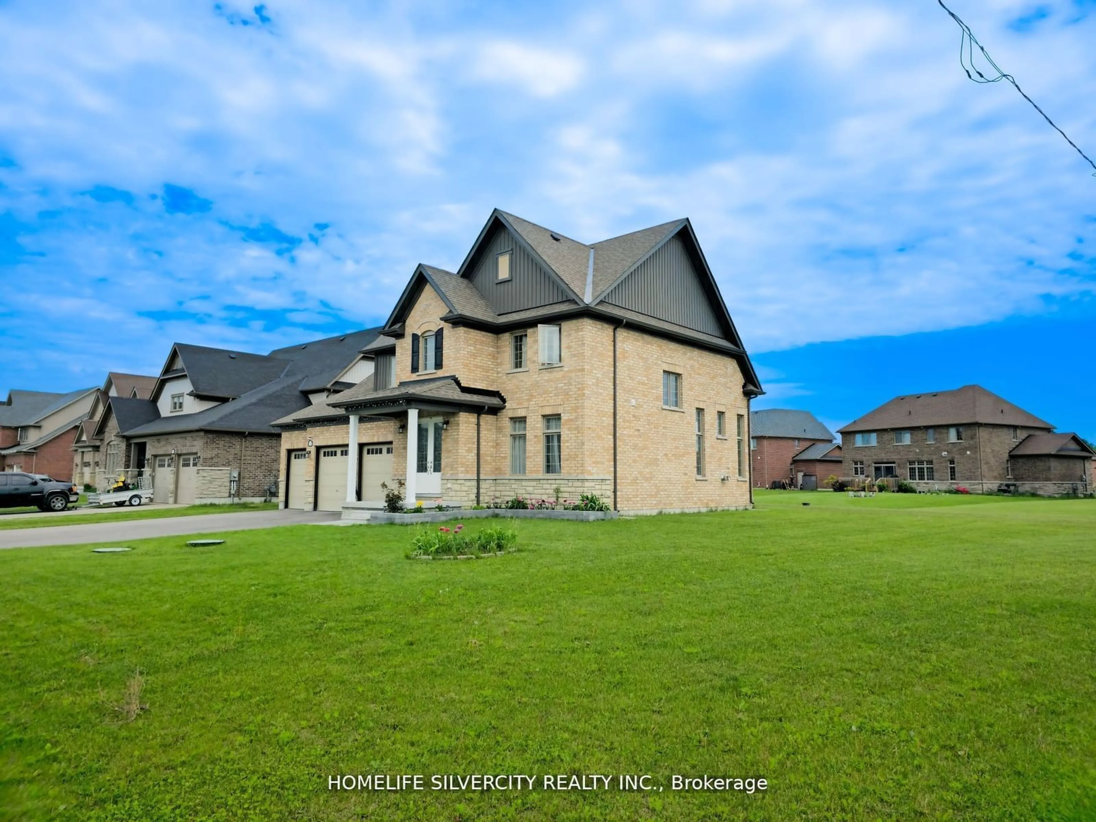 A pic from outside/outdoor area/front of a property/back of a property/a pic from drone, unknown for 12 Summer Breeze Dr, Quinte West Ontario K0K 1L0