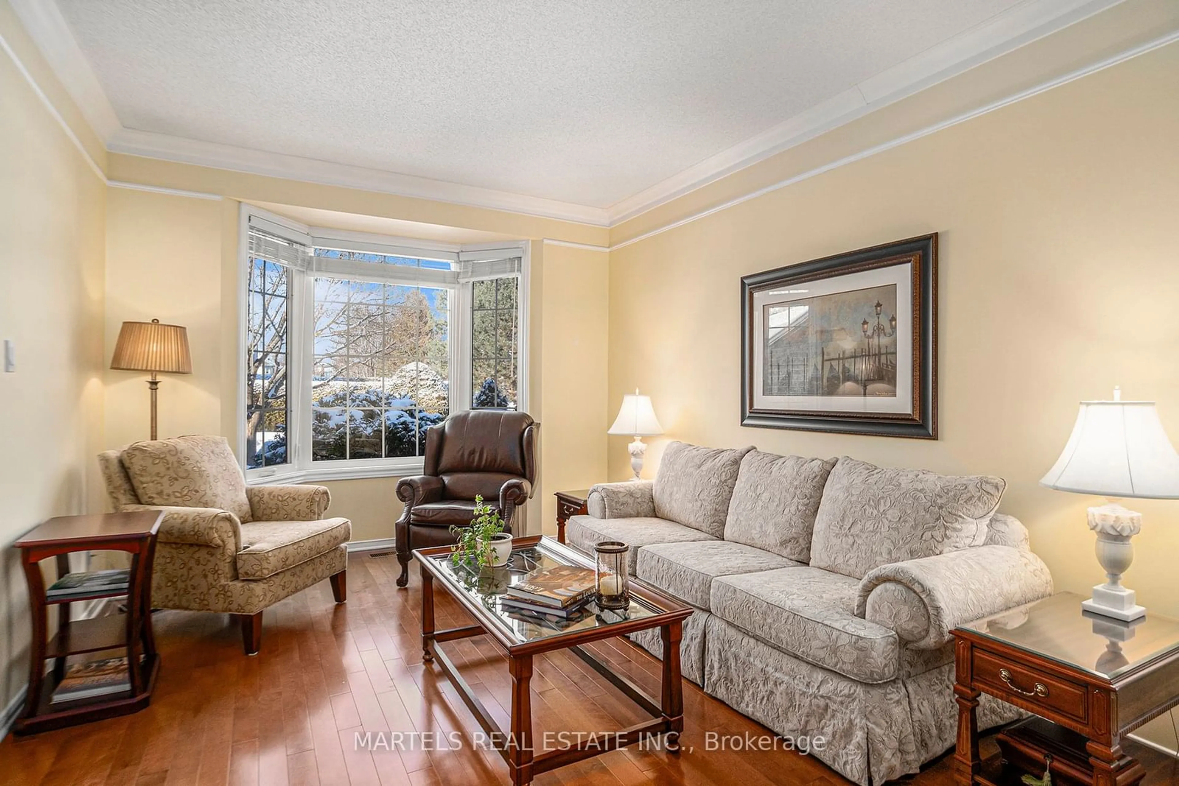 Living room with furniture, wood/laminate floor for 1959 Montclair Ave, Orleans - Convent Glen and Area Ontario K1W 1H9