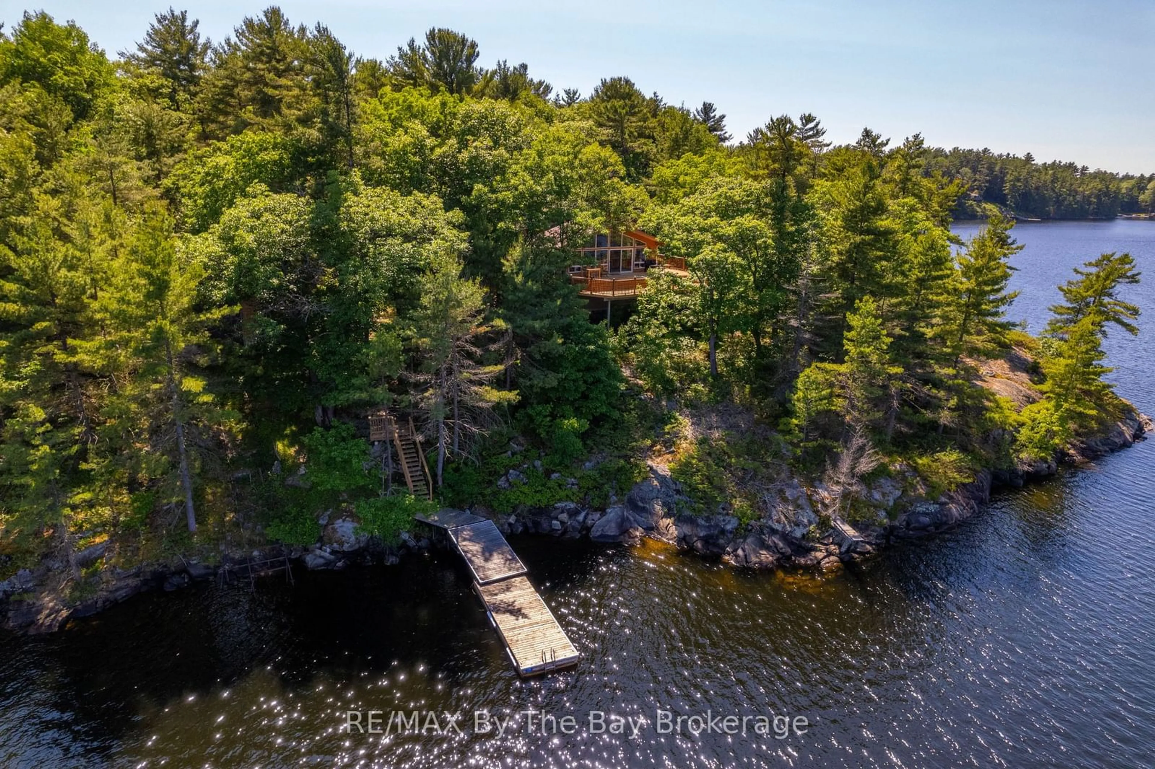 A pic from outside/outdoor area/front of a property/back of a property/a pic from drone, water/lake/river/ocean view for 3140 Island 1810, Georgian Bay Ontario P0E 1E0