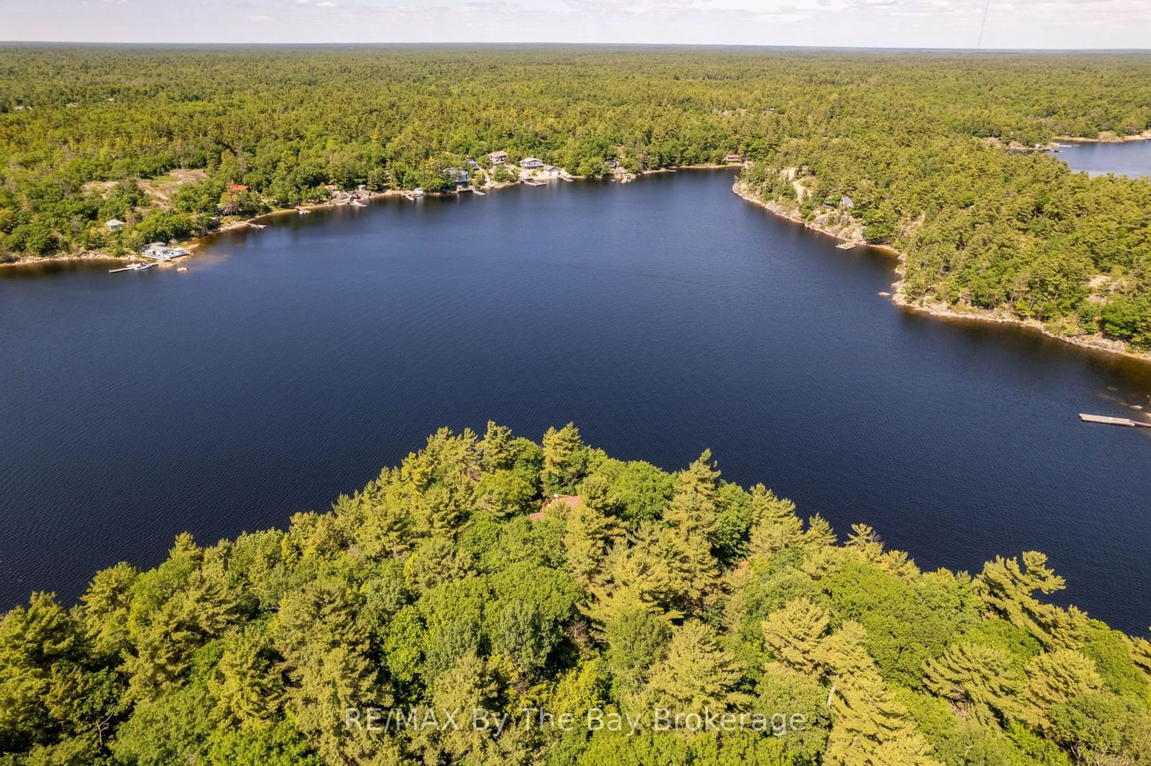 A pic from outside/outdoor area/front of a property/back of a property/a pic from drone, water/lake/river/ocean view for 3140 Island 1810, Georgian Bay Ontario P0E 1E0