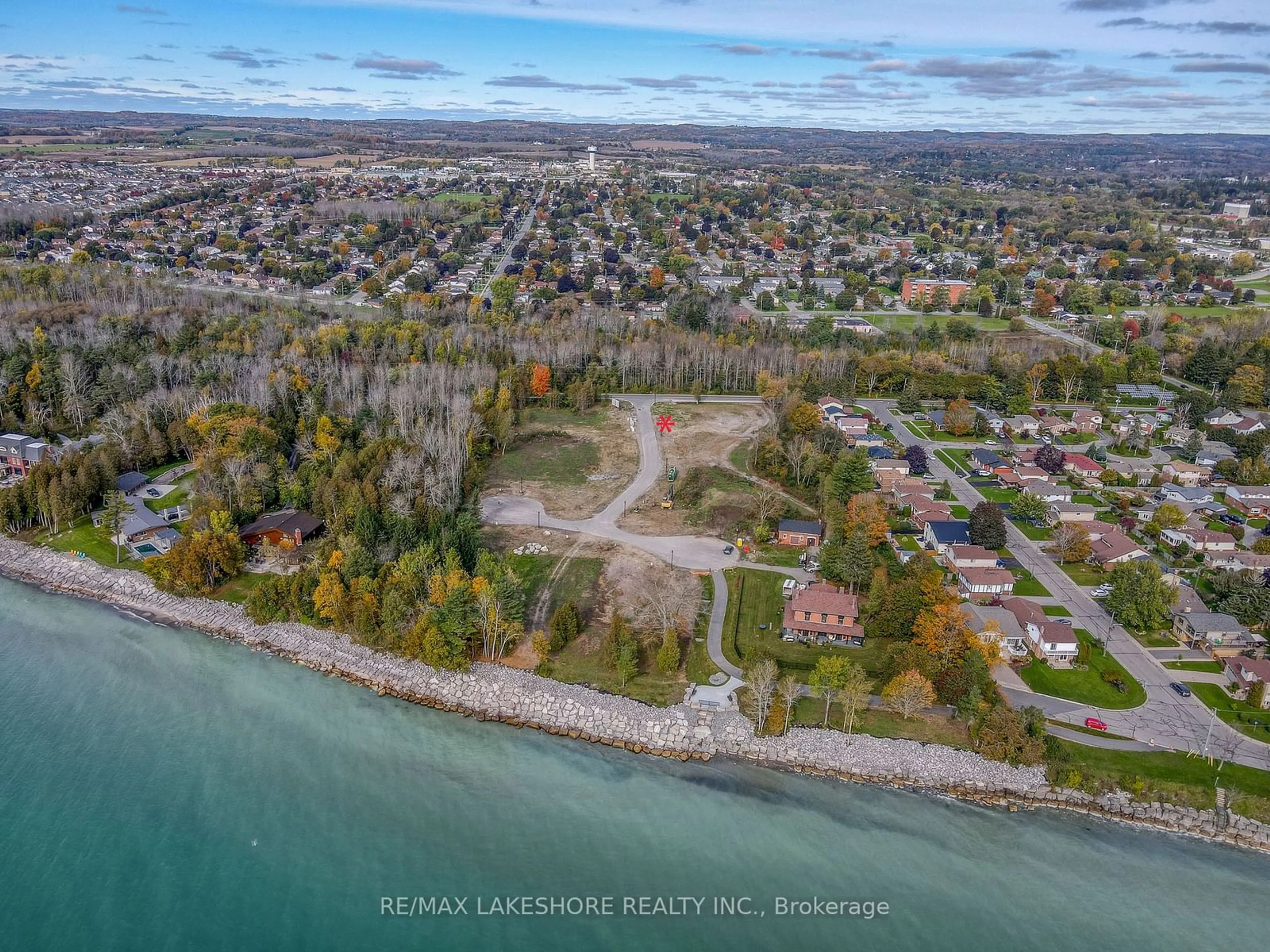 A pic from outside/outdoor area/front of a property/back of a property/a pic from drone, water/lake/river/ocean view for 210 SUZANNE MESS Blvd, Cobourg Ontario K9A 3L3