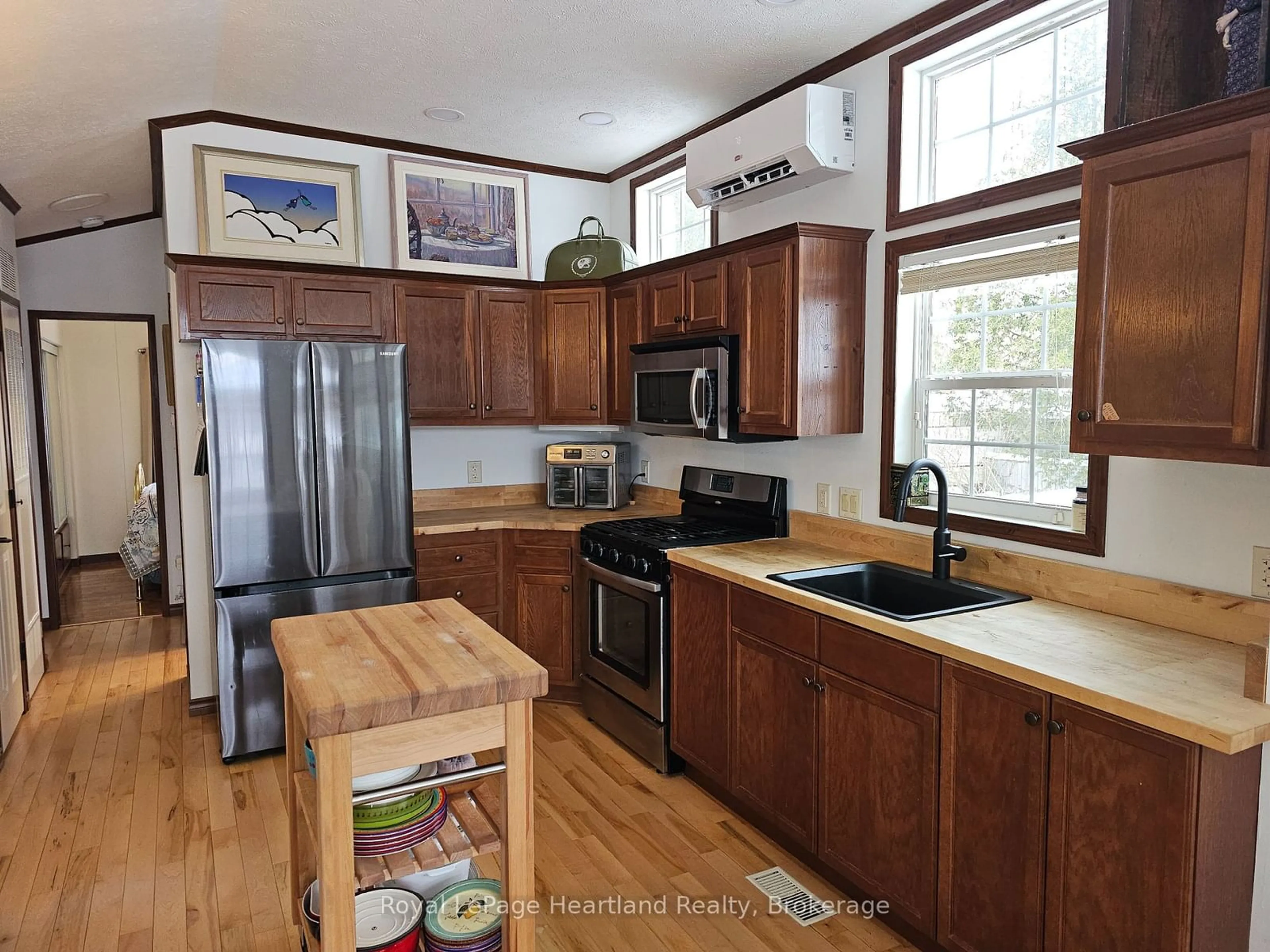 Open concept kitchen, wood/laminate floor for 76735 Wildwood Line, Bluewater Ontario N0M 1G0