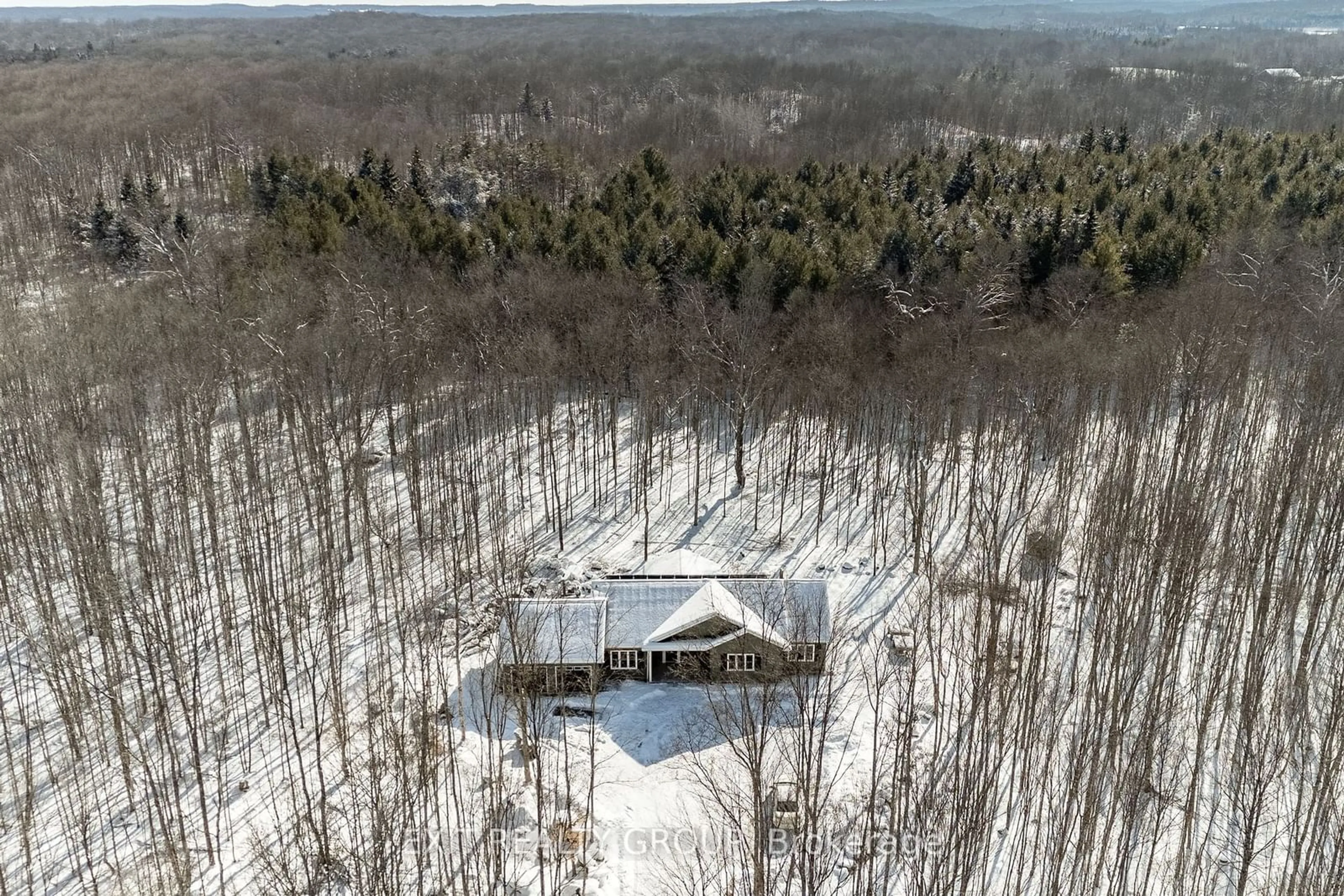 A pic from outside/outdoor area/front of a property/back of a property/a pic from drone, forest/trees view for 1912 Moneymore Rd, Tweed Ontario K0K 2Y0