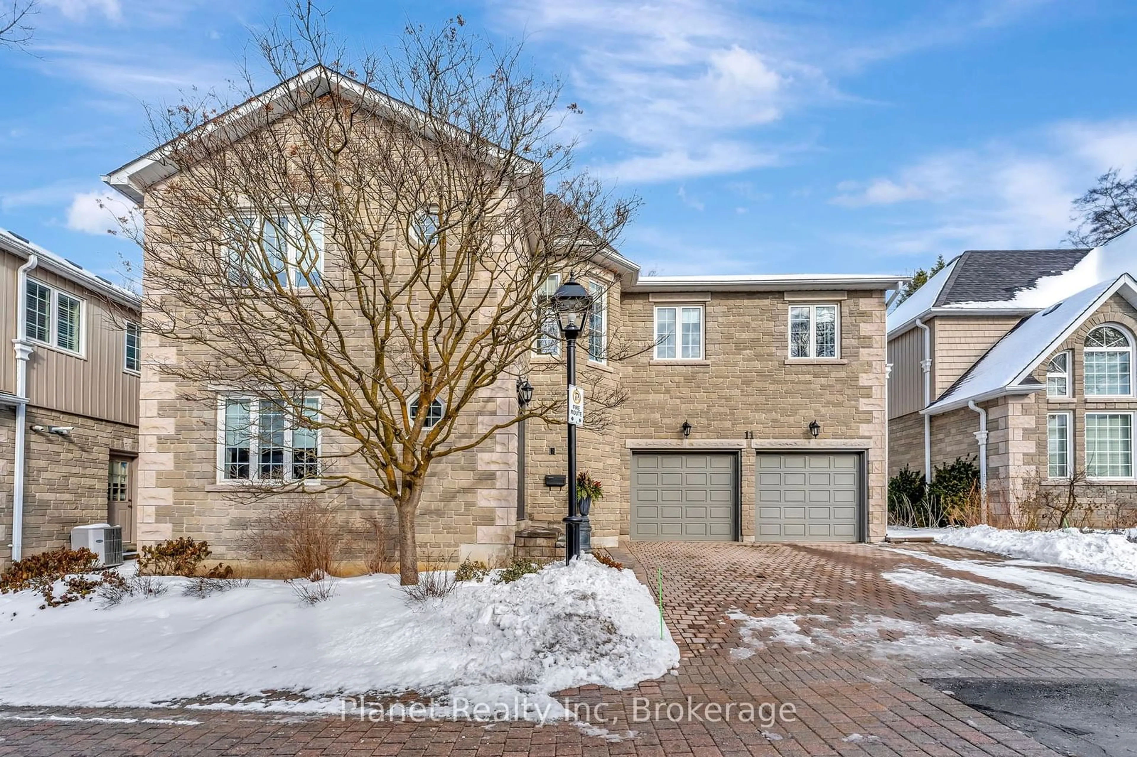 Home with brick exterior material, street for 25 Manor Park Cres #11, Guelph Ontario N1G 1A2