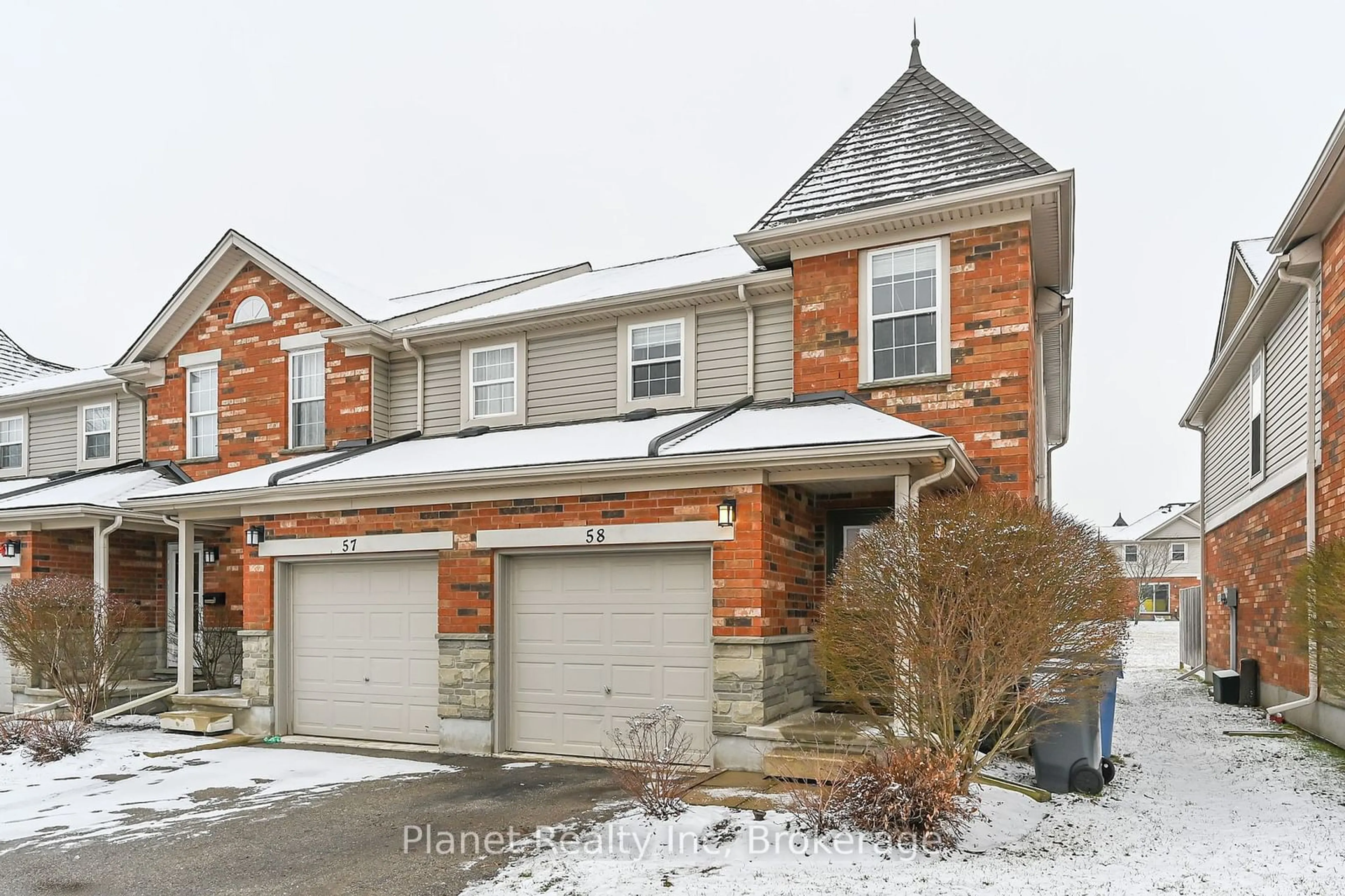 Home with brick exterior material, street for 124 Gosling Gdns #58, Guelph Ontario N1G 5K6