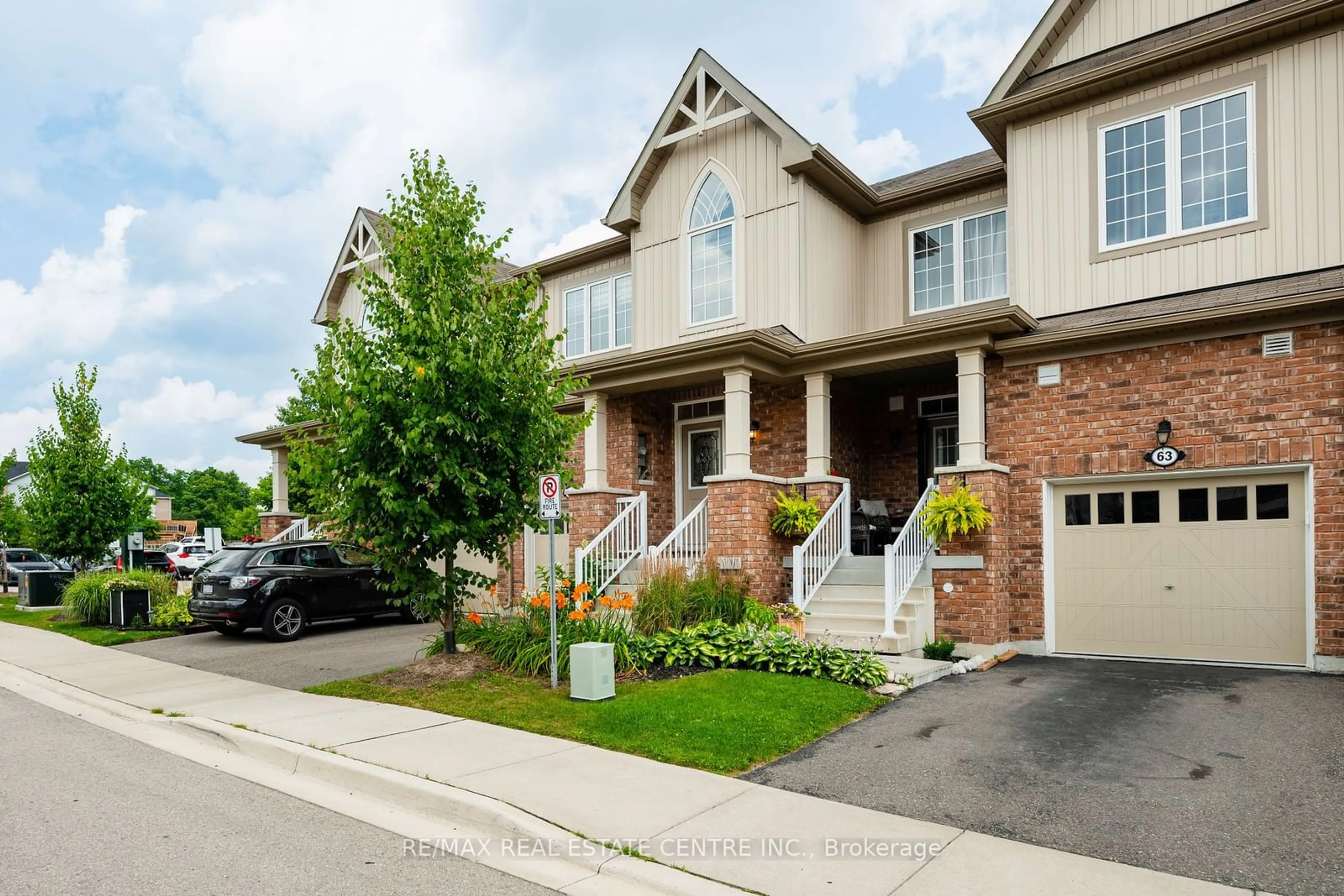 Home with brick exterior material, street for 65 Leeson St, East Luther Grand Valley Ontario L9W 7P8