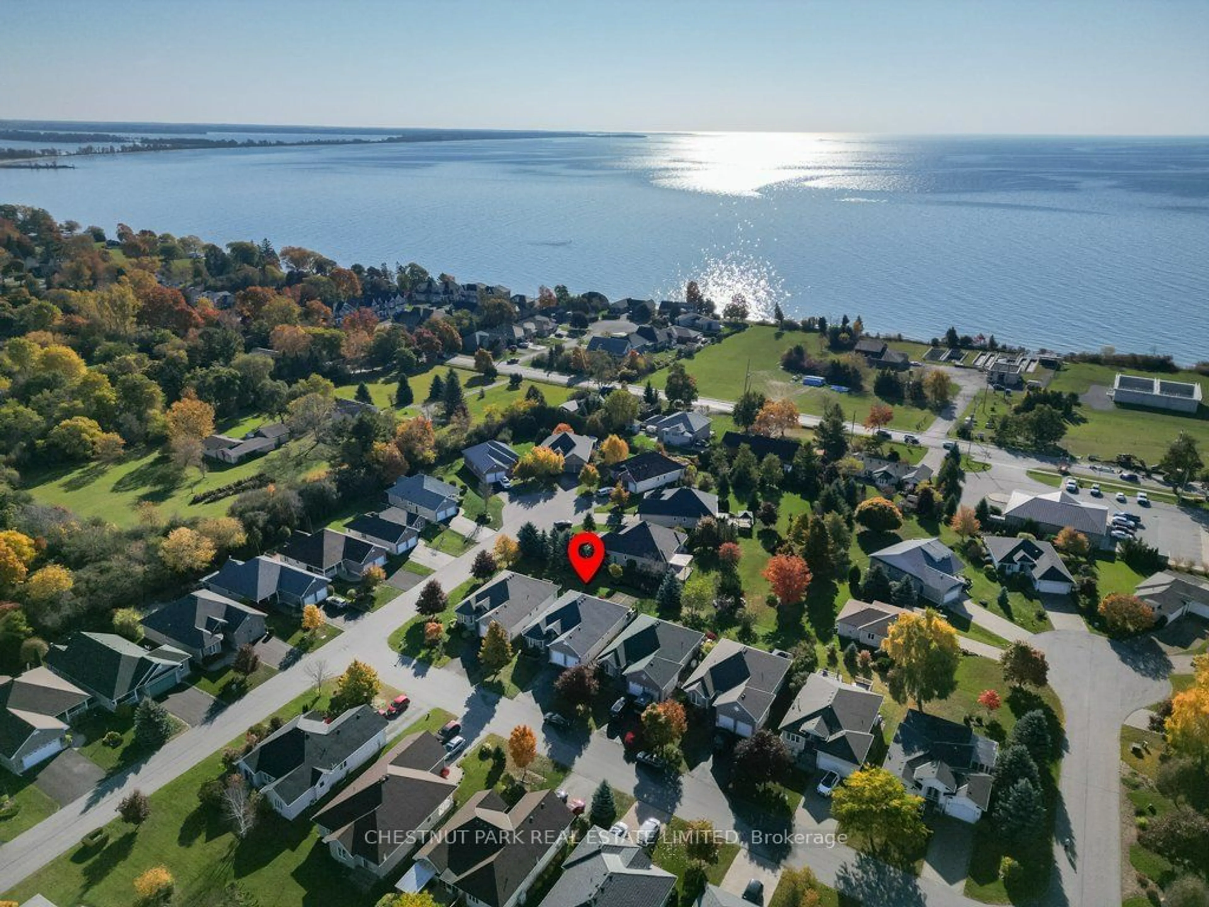 A pic from outside/outdoor area/front of a property/back of a property/a pic from drone, water/lake/river/ocean view for 60 Elmdale Dr, Prince Edward County Ontario K0K 3L0