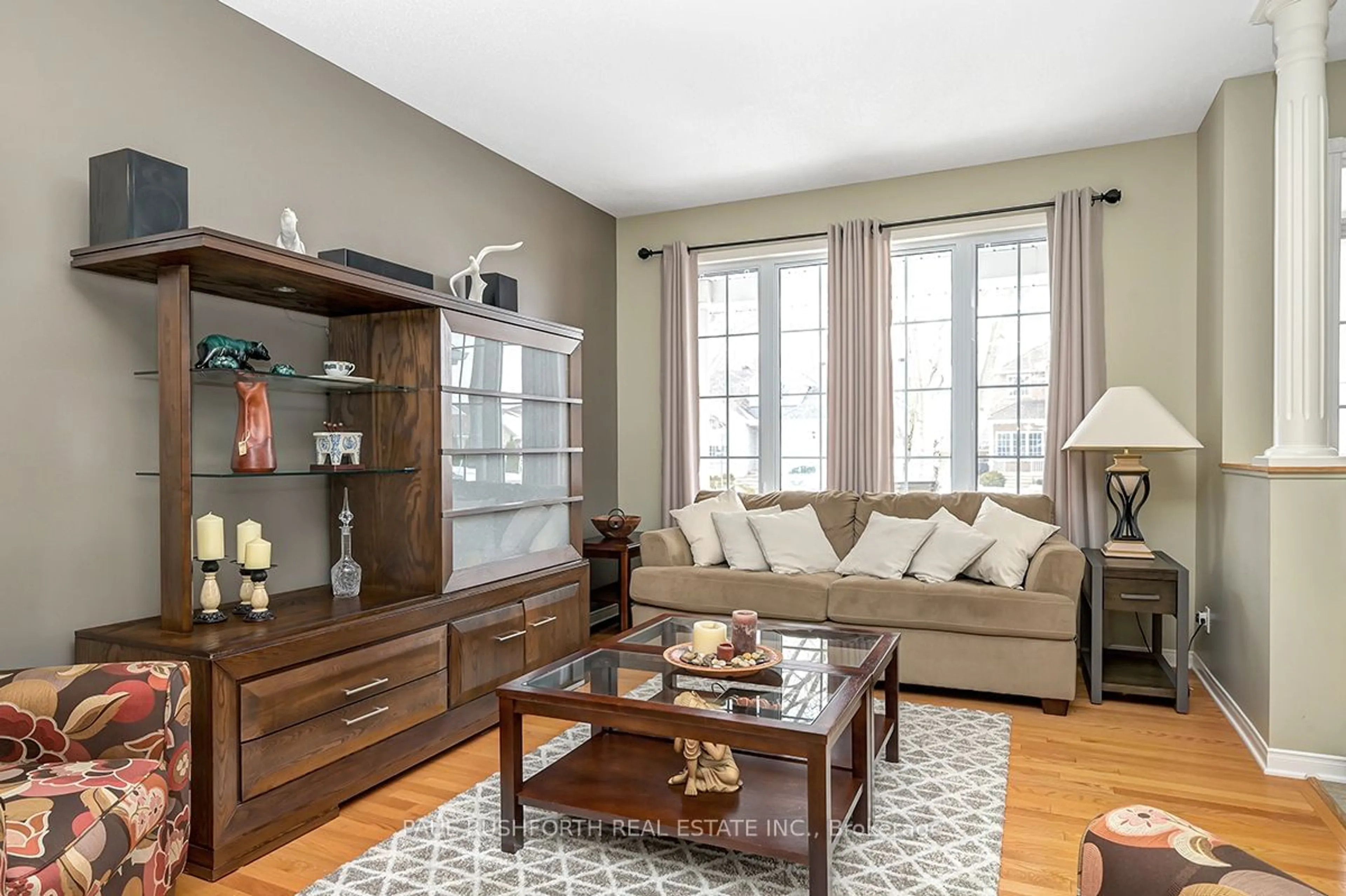 Living room with furniture, wood/laminate floor for 351 Centenaire St, Russell Ontario K0A 1W0