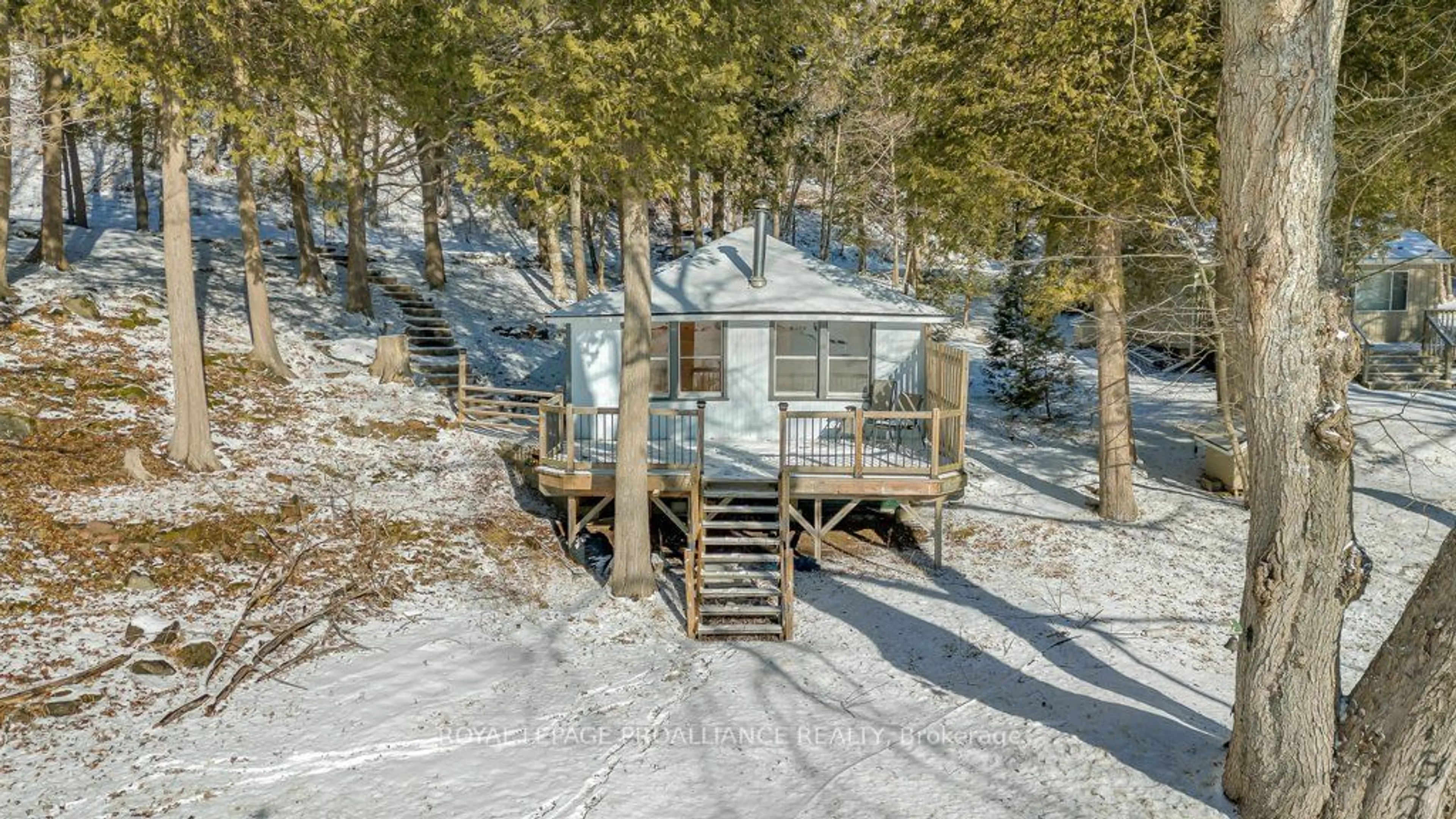 A pic from outside/outdoor area/front of a property/back of a property/a pic from drone, water/lake/river/ocean view for 2077 Hambly Lane, South Frontenac Ontario K0H 1W0